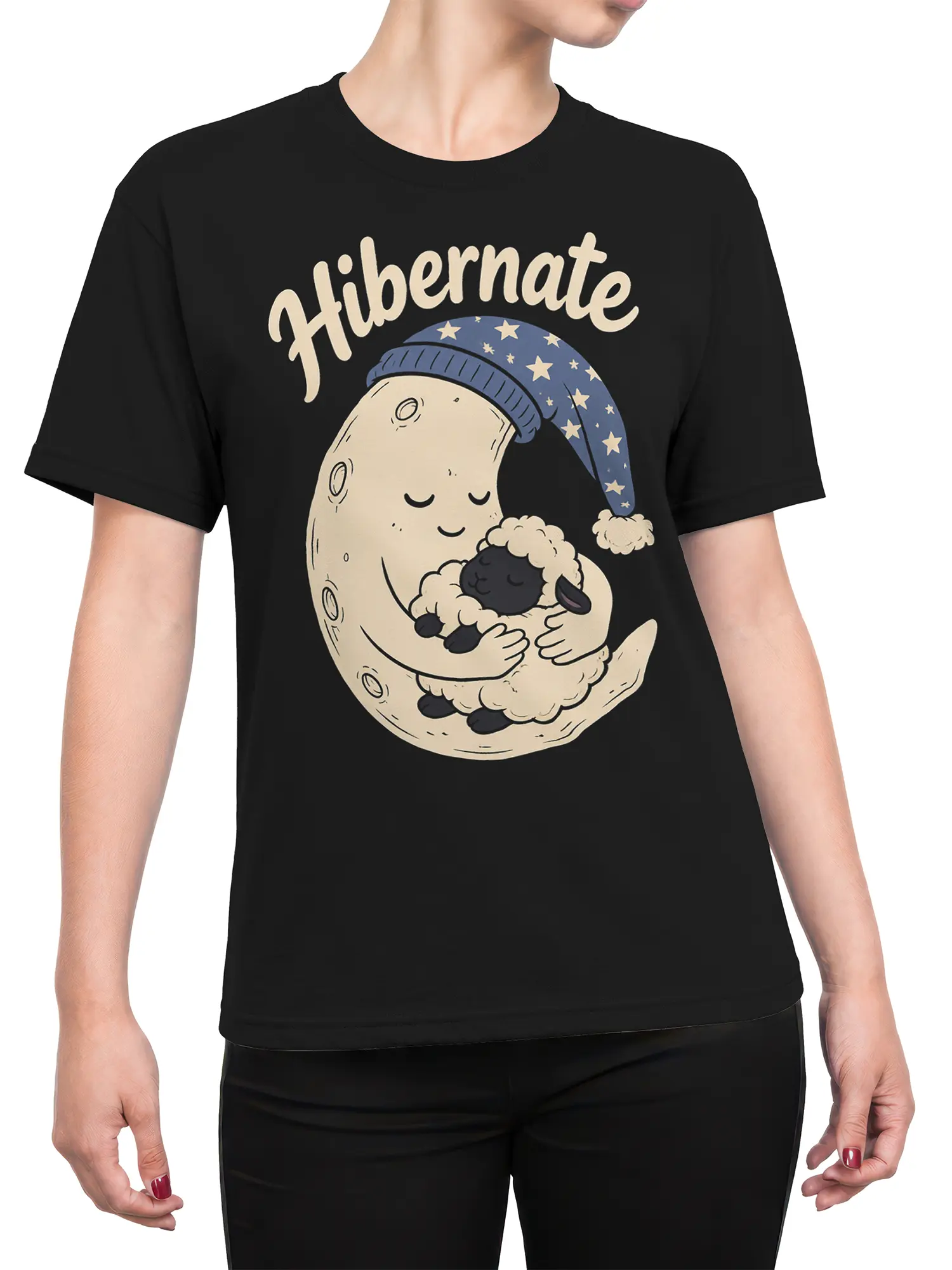 Female torso wearing a black T-shirt with a sleepy moon, cuddled sheep, starry cap, and Hibernate lettering