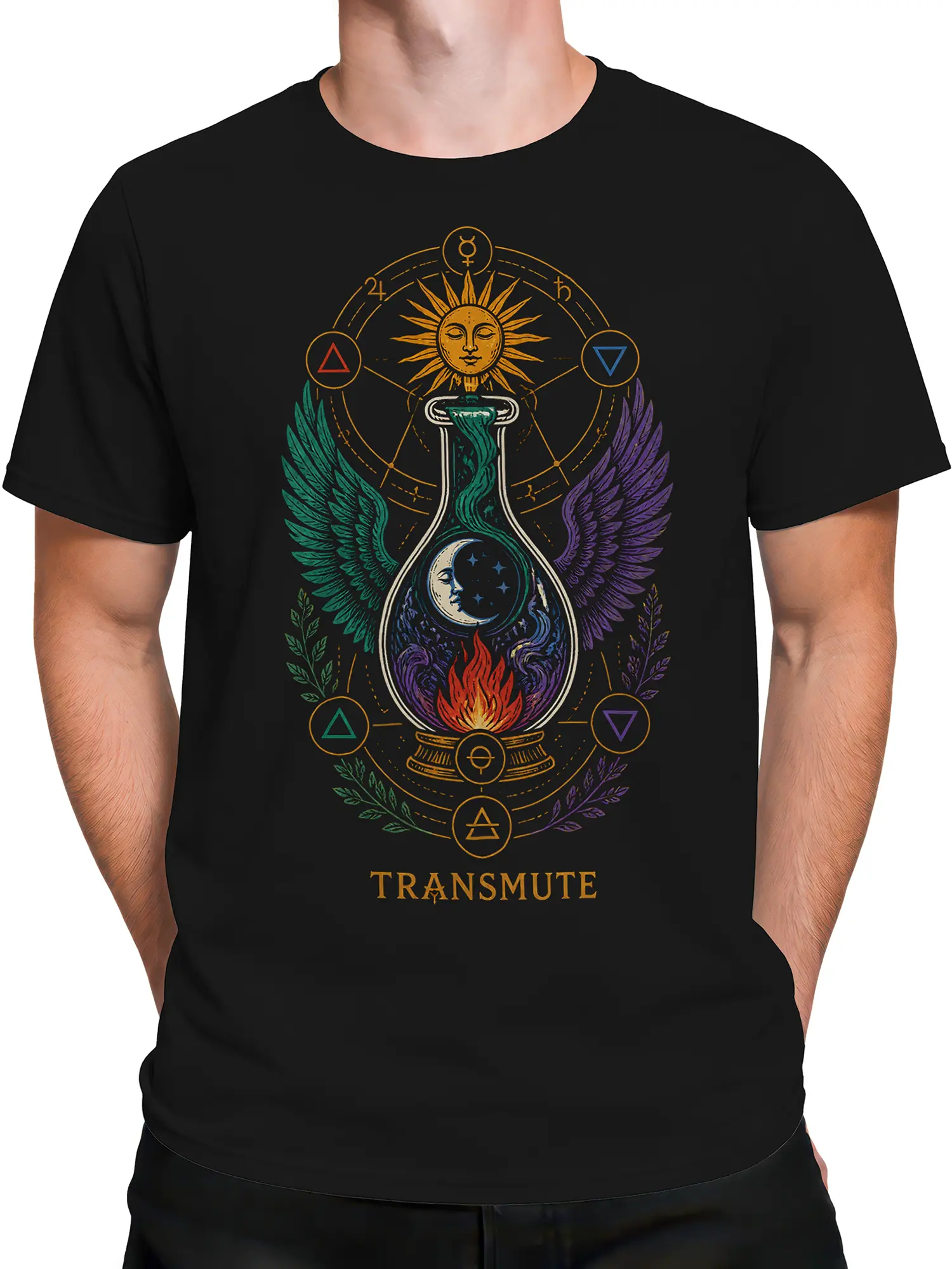 Male torso wearing a black T-shirt with a winged alchemy vessel, celestial symbols, and TRANSMUTE