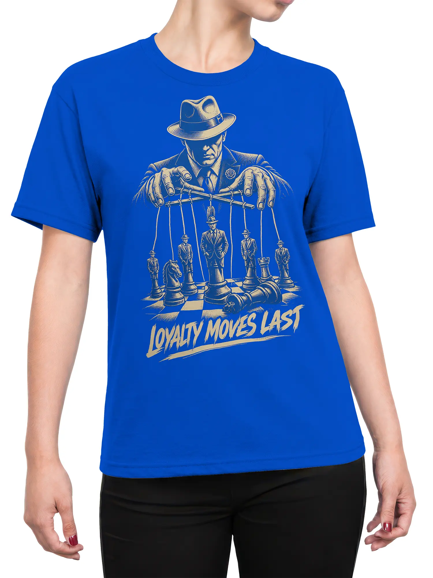 Female torso wearing a blue T-shirt with a vintage chess puppetmaster design, cream line art, and LOYALTY MOVES LAST text