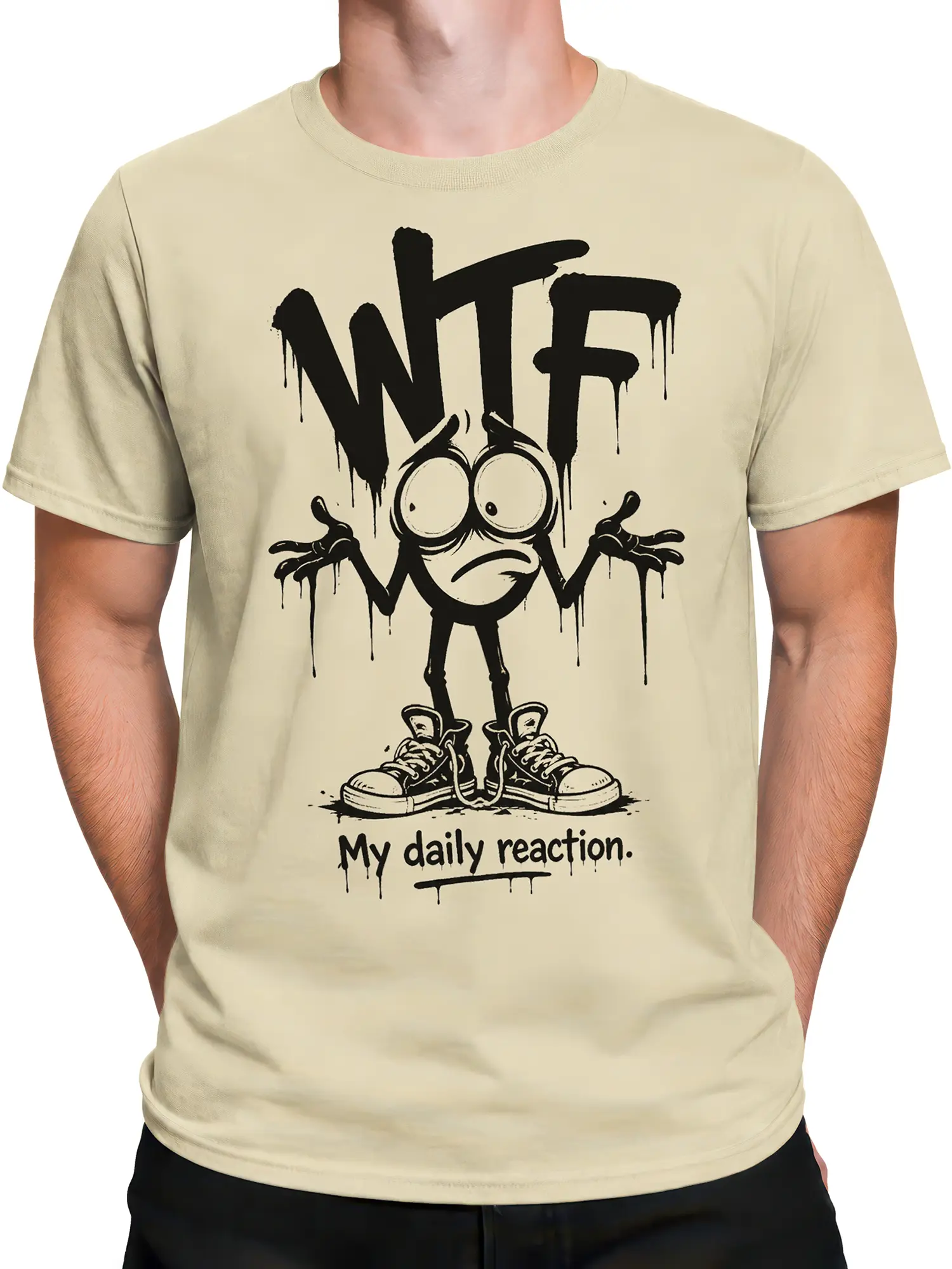 Male torso wearing a beige graphic T-shirt with cartoon reaction artwork and bold dripping WTF lettering