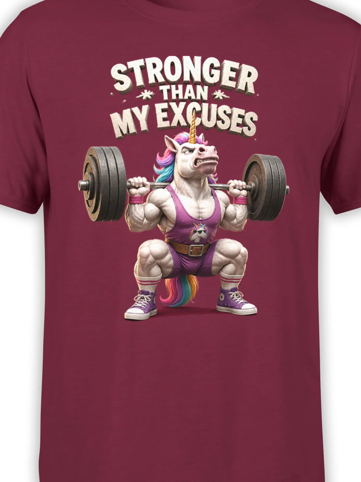 Close-up of the muscular unicorn barbell design and bold lettering on a burgundy T-shirt