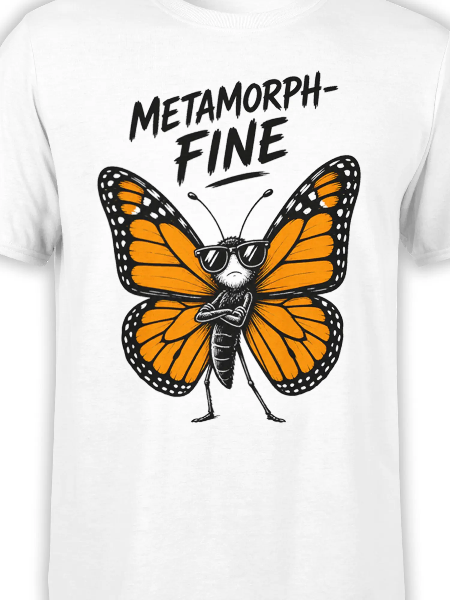Close-up of black-and-orange butterfly artwork with sunglasses on a white graphic T-shirt