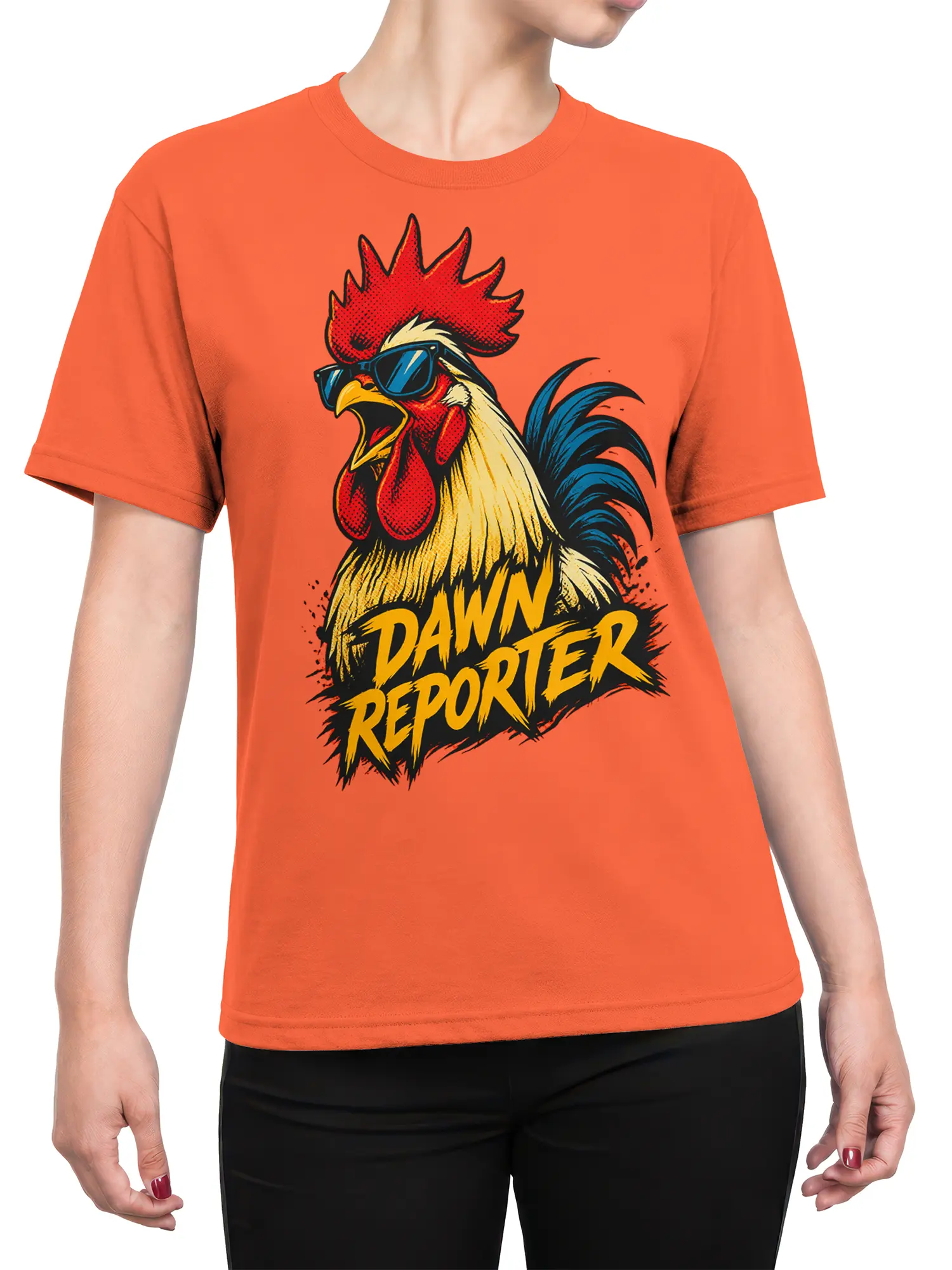 Female torso wearing an orange rooster T-shirt with a bold Dawn Reporter graphic