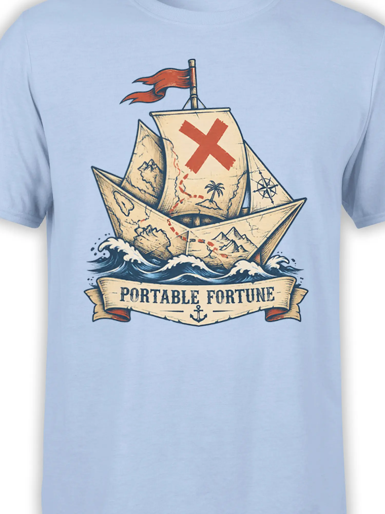 Close-up of the nautical paper boat graphic and Portable Fortune banner on a light blue T-shirt