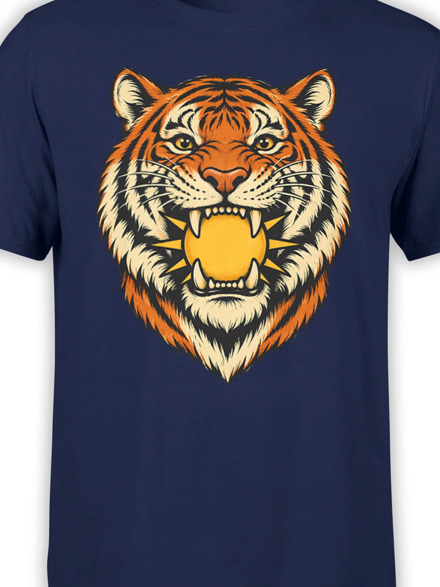 Close-up of a fierce tiger graphic with golden eyes and a sun on a navy shirt