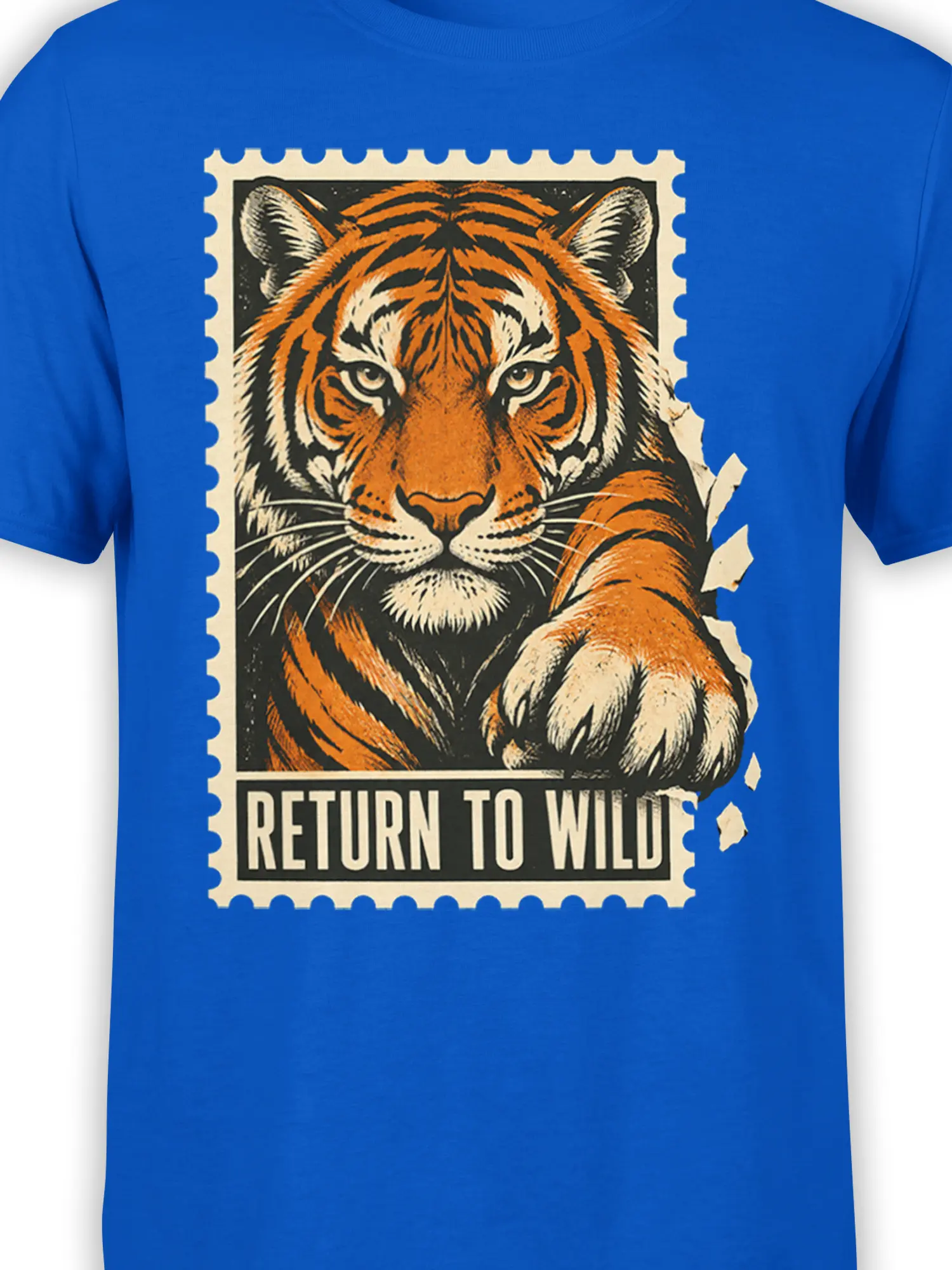 Close-up of the orange tiger face, raised paw, and Return to Wild graphic on a blue T-shirt