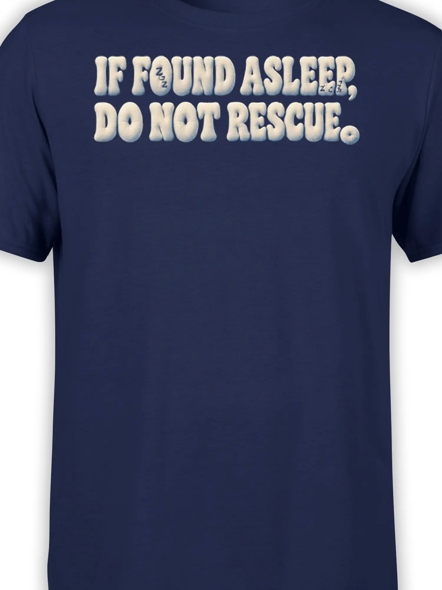 Close-up of white sleep slogan lettering and small sleep marks on a navy T-shirt