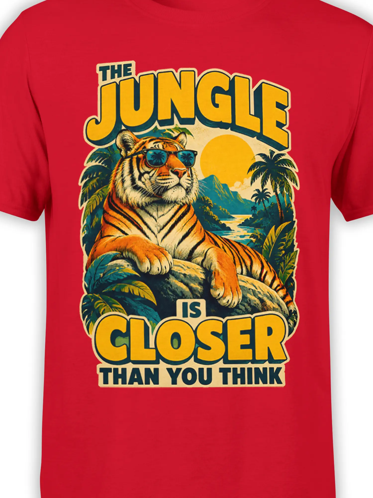 Close-up of tiger in sunglasses and tropical jungle artwork printed on a red graphic T-shirt
