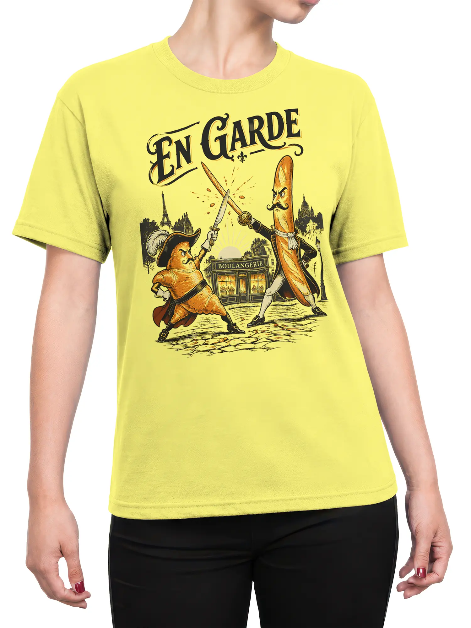 Female torso wearing a yellow French T-shirt with baguette duel artwork and Paris bakery scenery