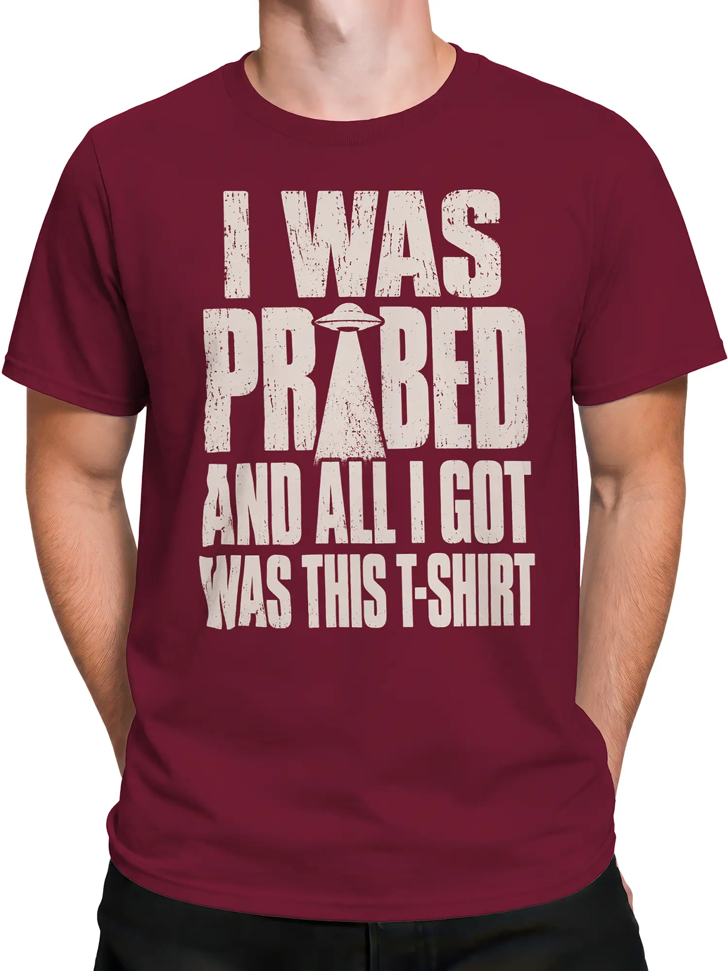 Male torso wearing burgundy alien T-shirt with retro UFO slogan graphic