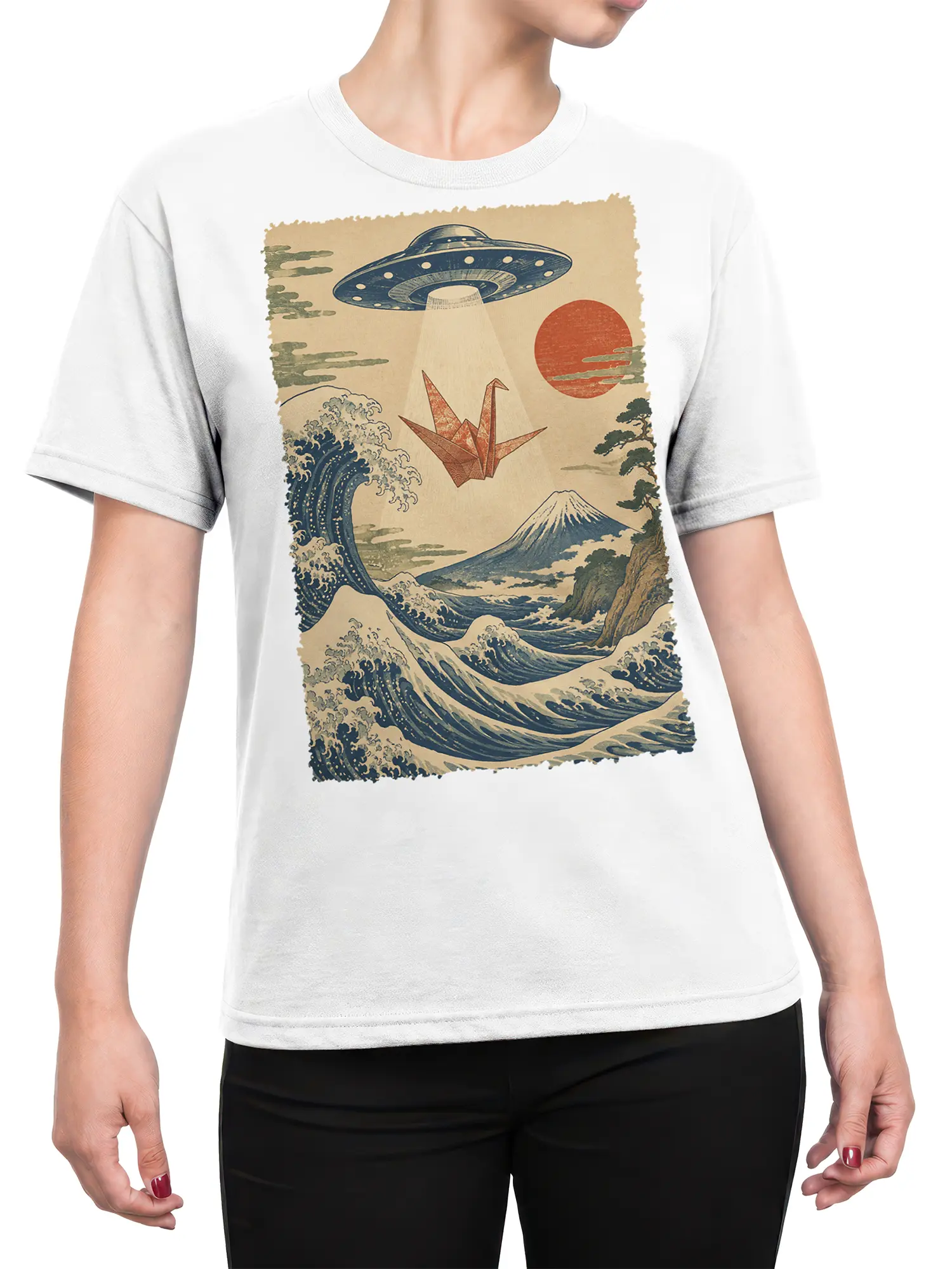 Female torso wearing a white UFO T-shirt with waves, origami crane, red sun, and mountain art