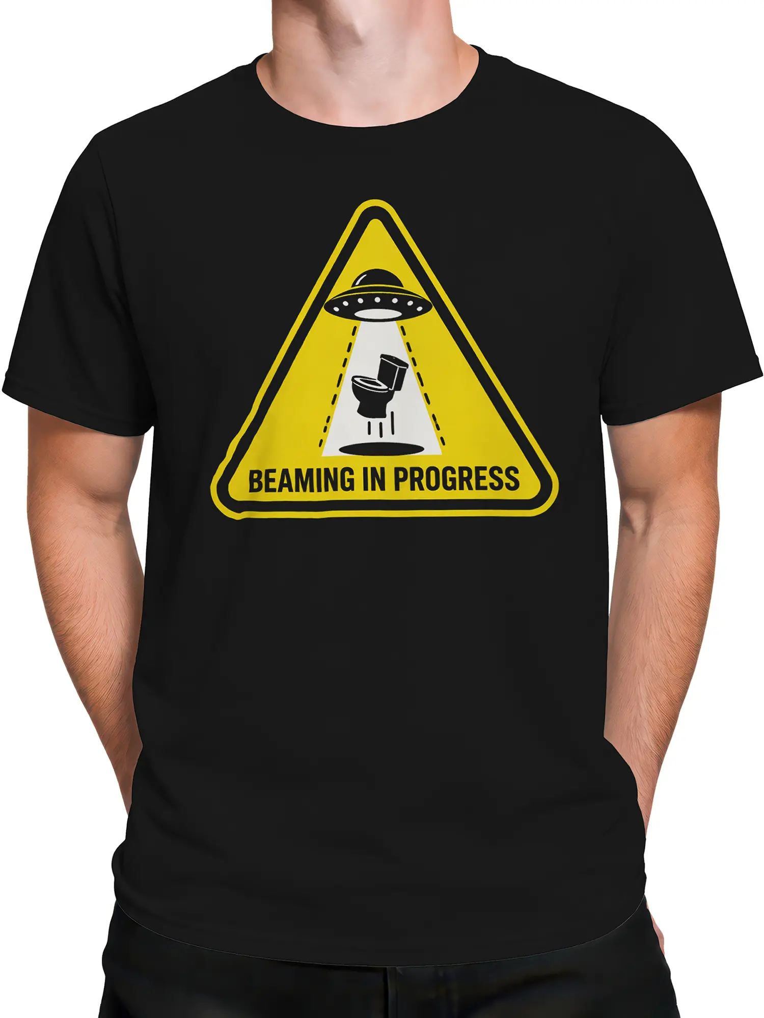 Male torso wearing a black UFO graphic tee with a yellow warning triangle and toilet beam design