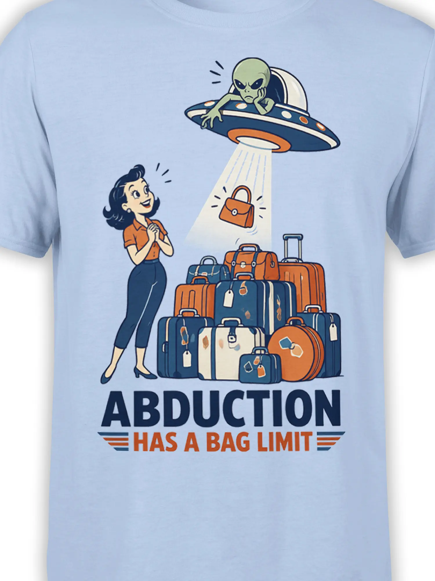 Close-up of retro UFO alien and colorful suitcases on a light blue travel humor T-shirt