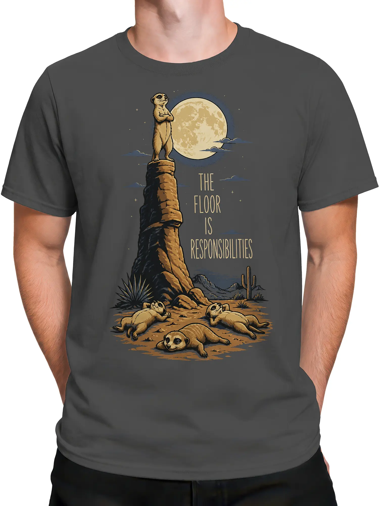 Male torso wearing a gray meerkat graphic tee with four animals, a full moon, and desert artwork