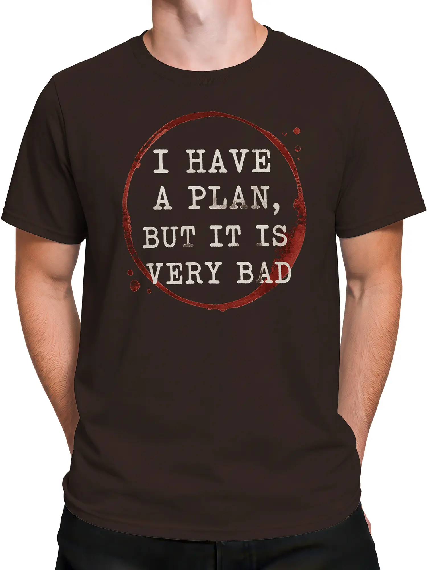 Male torso wearing a brown graphic tee with distressed red circle and cream bad plan lettering