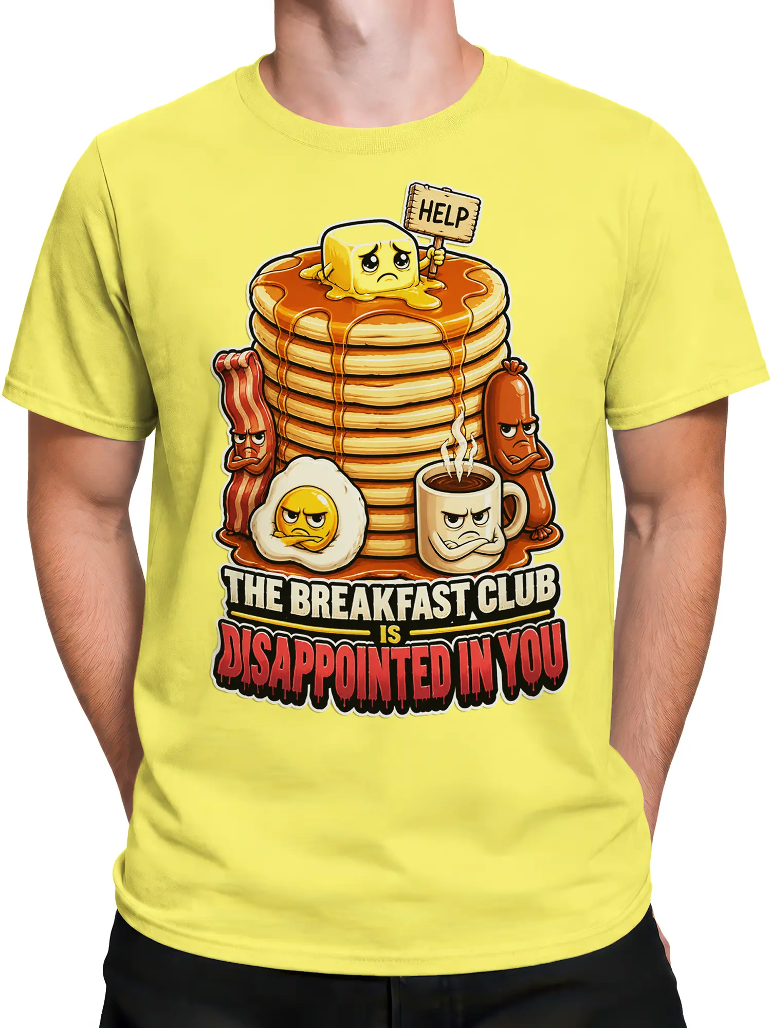 Male torso wearing a yellow breakfast t-shirt with grumpy food characters and a sarcastic breakfast slogan