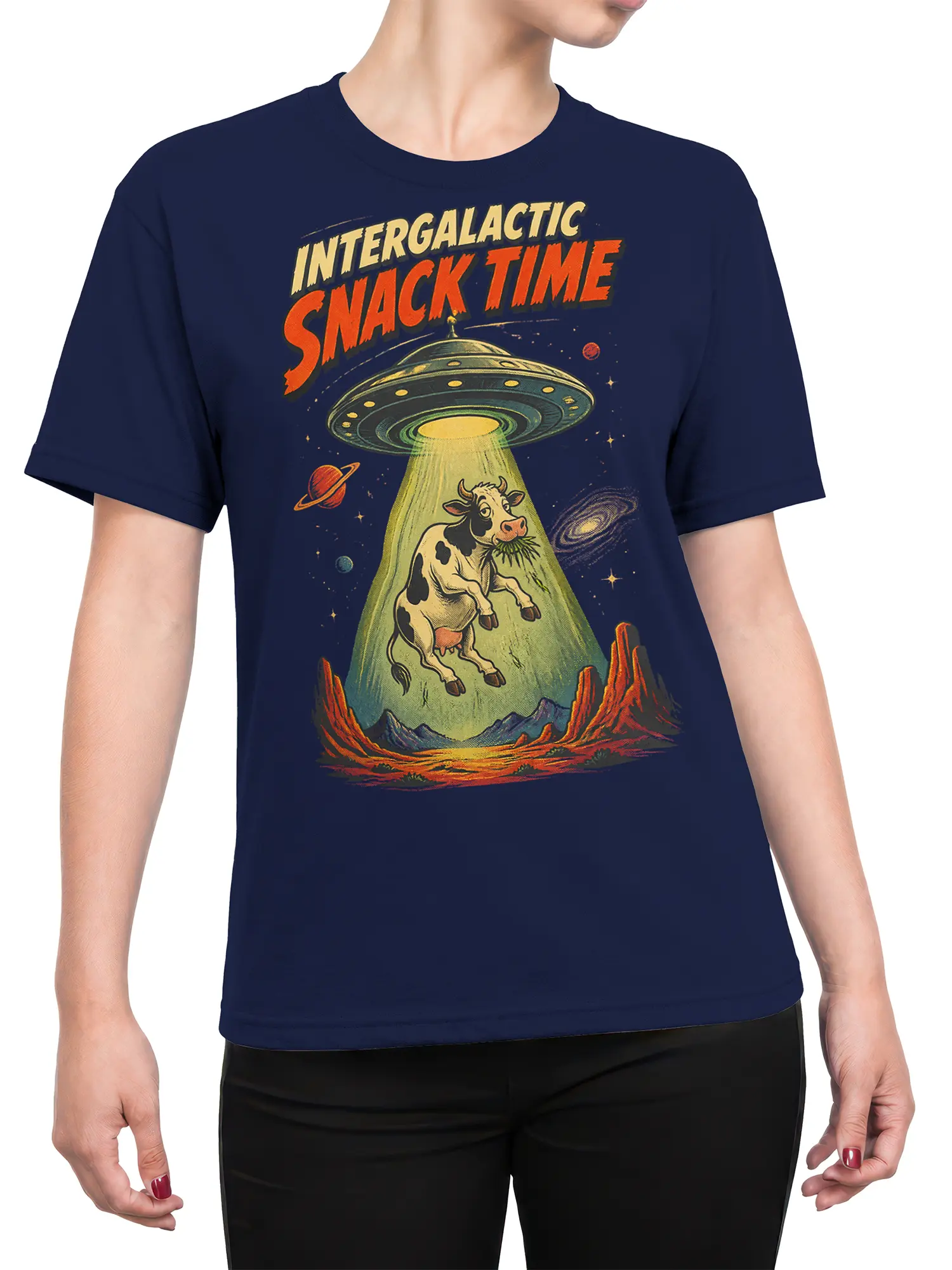 Female torso wearing a navy T-shirt with a vintage intergalactic UFO cow graphic