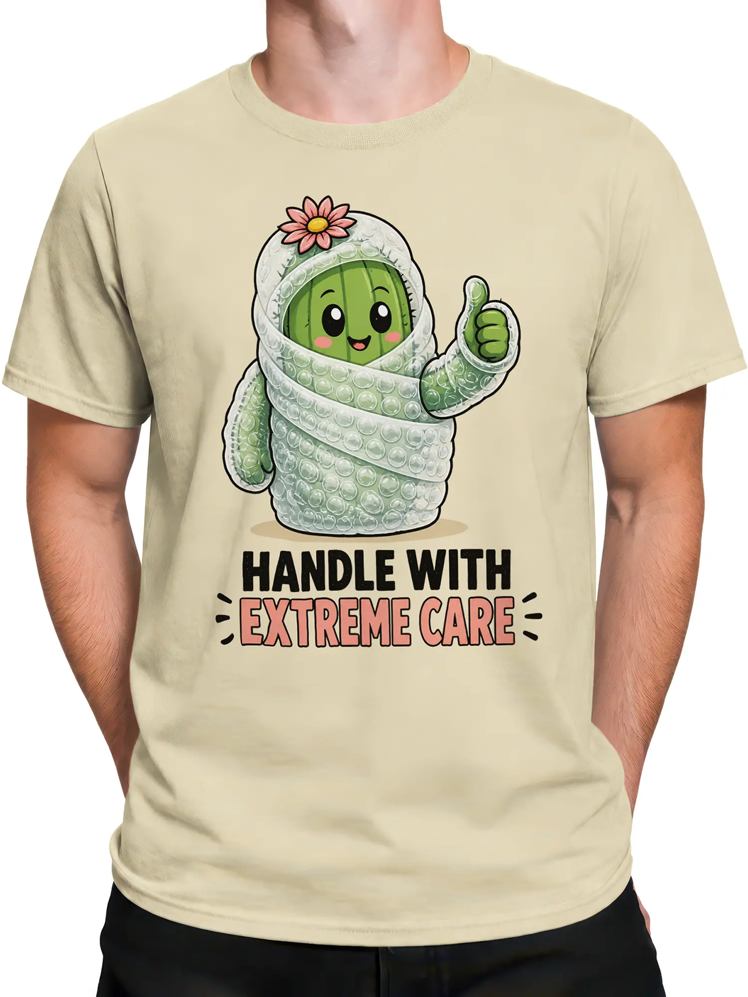 Male torso wearing a beige cactus T-shirt with bubble wrap, flower detail, thumbs-up, and care-themed text