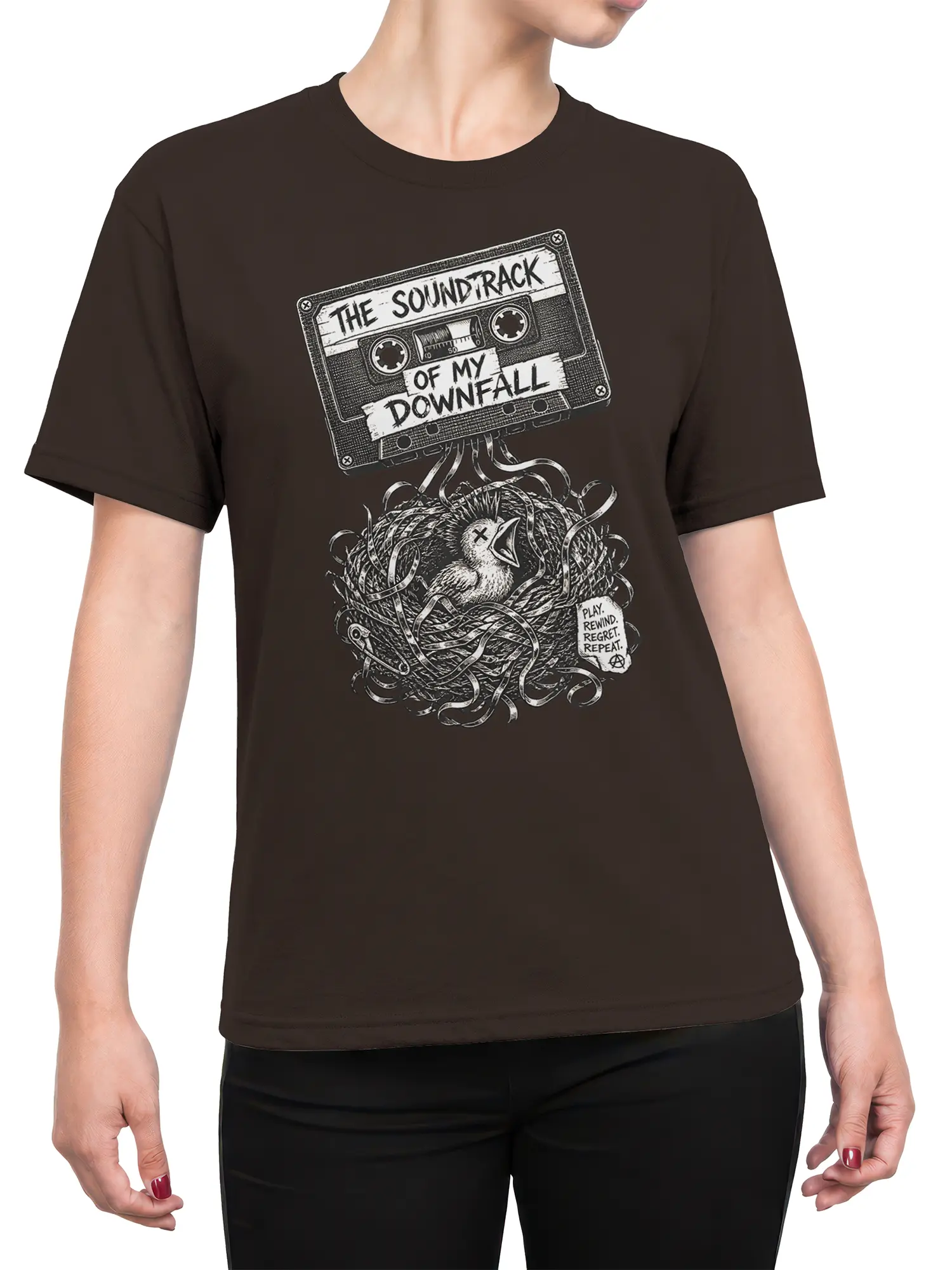Female torso wearing a brown cassette tape t-shirt with a chick, tangled nest, and vintage music artwork