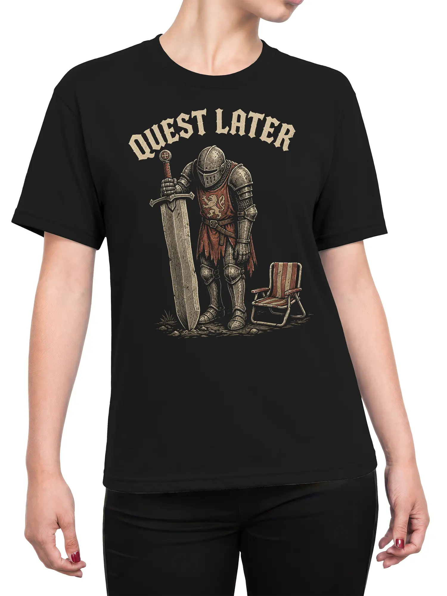 Female torso wearing a black Quest Later T-shirt with knight, sword, chair, and fantasy artwork