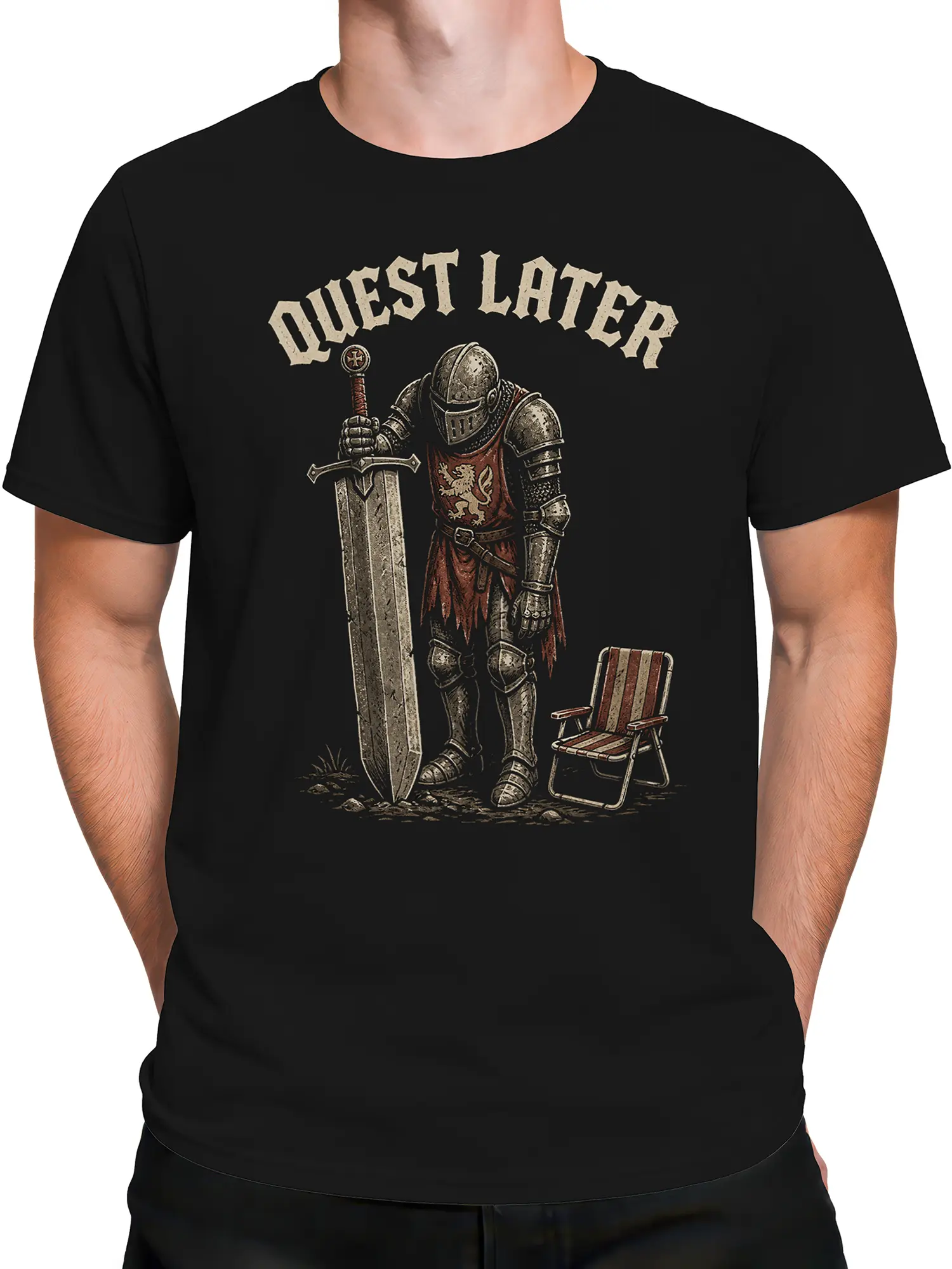 Male torso wearing a black Quest Later T-shirt with armored knight and giant sword artwork