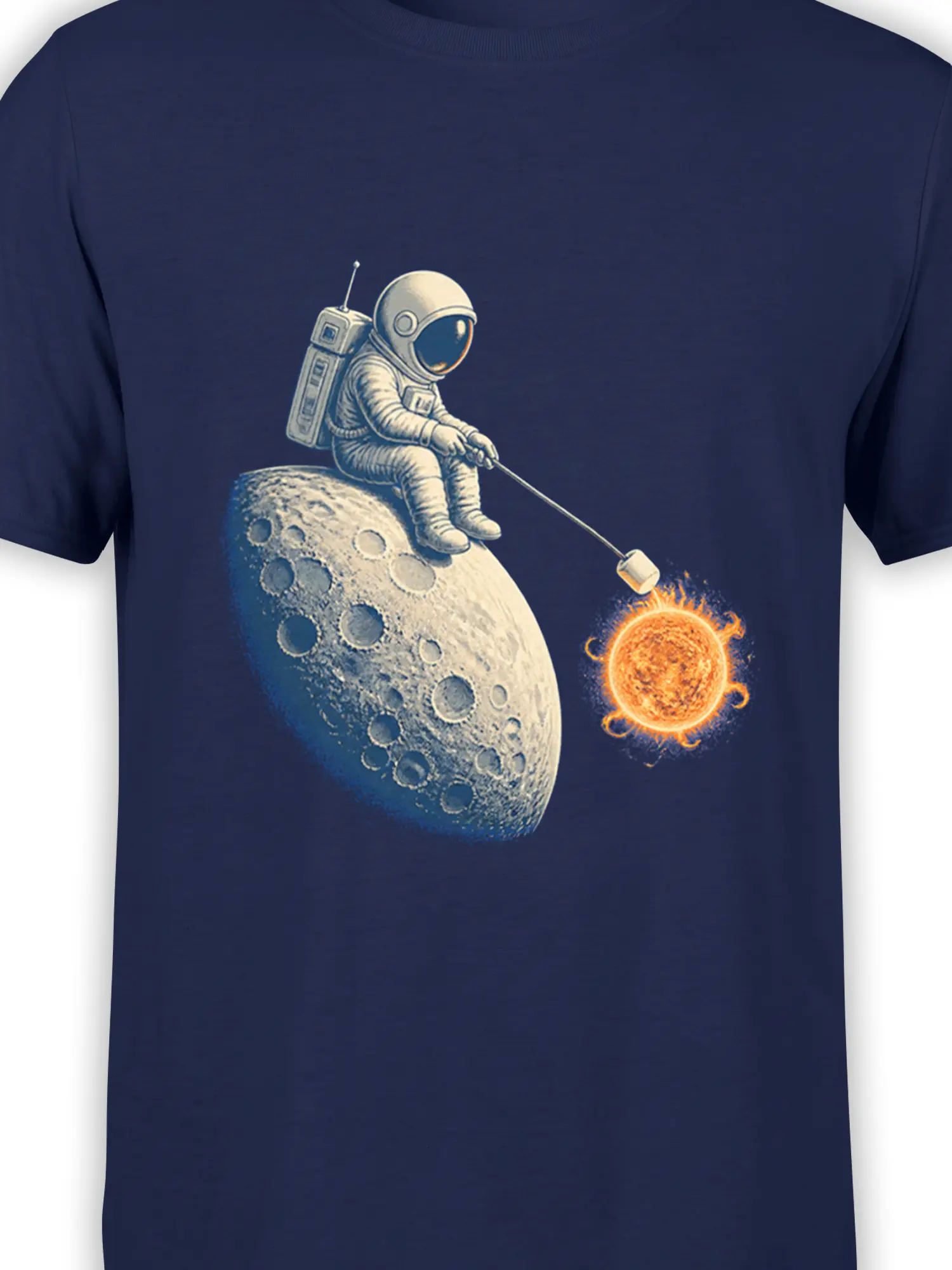 Close-up of astronaut, cratered moon, and glowing sun graphic on a blue space T-shirt