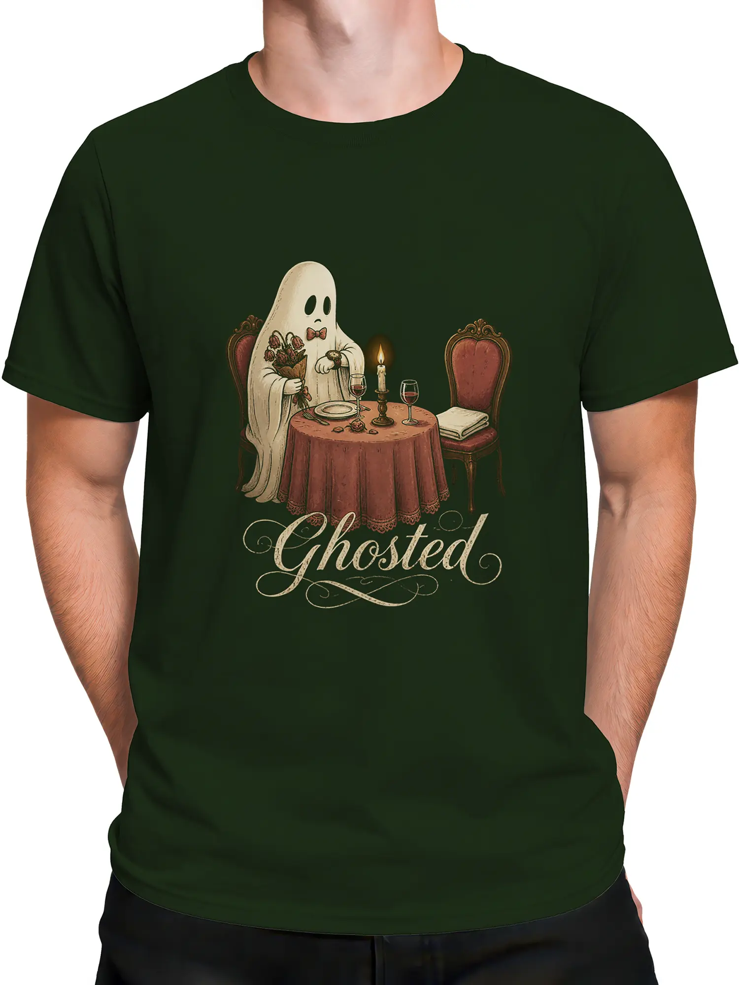 Male torso wearing a dark green Ghosted T-shirt featuring a vintage ghost at a candlelit dinner