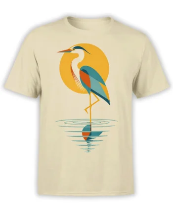 Stylized heron bird graphic with golden sun and teal water ripples on a beige T-shirt