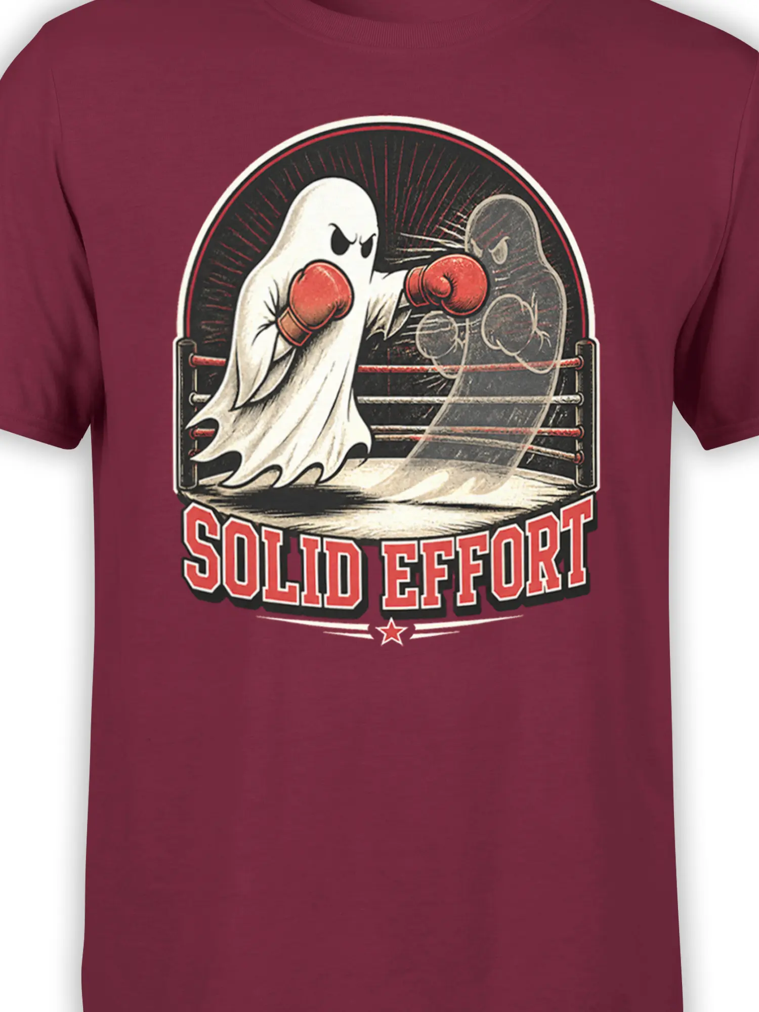 Close-up of two ghost boxers with red gloves and distressed “SOLID EFFORT” artwork on burgundy fabric