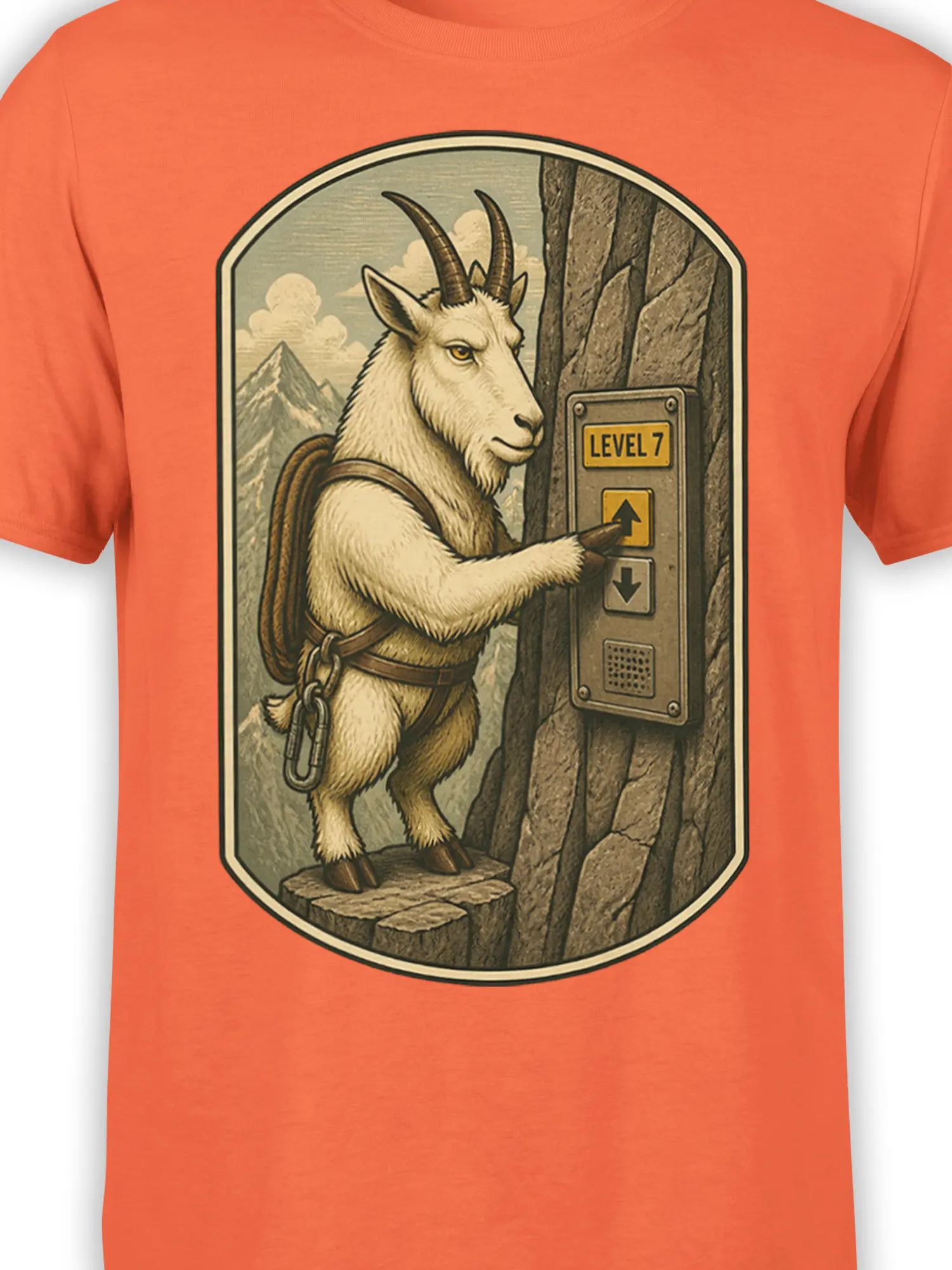 Close-up of the mountain goat climber and Level 7 elevator artwork on an orange shirt