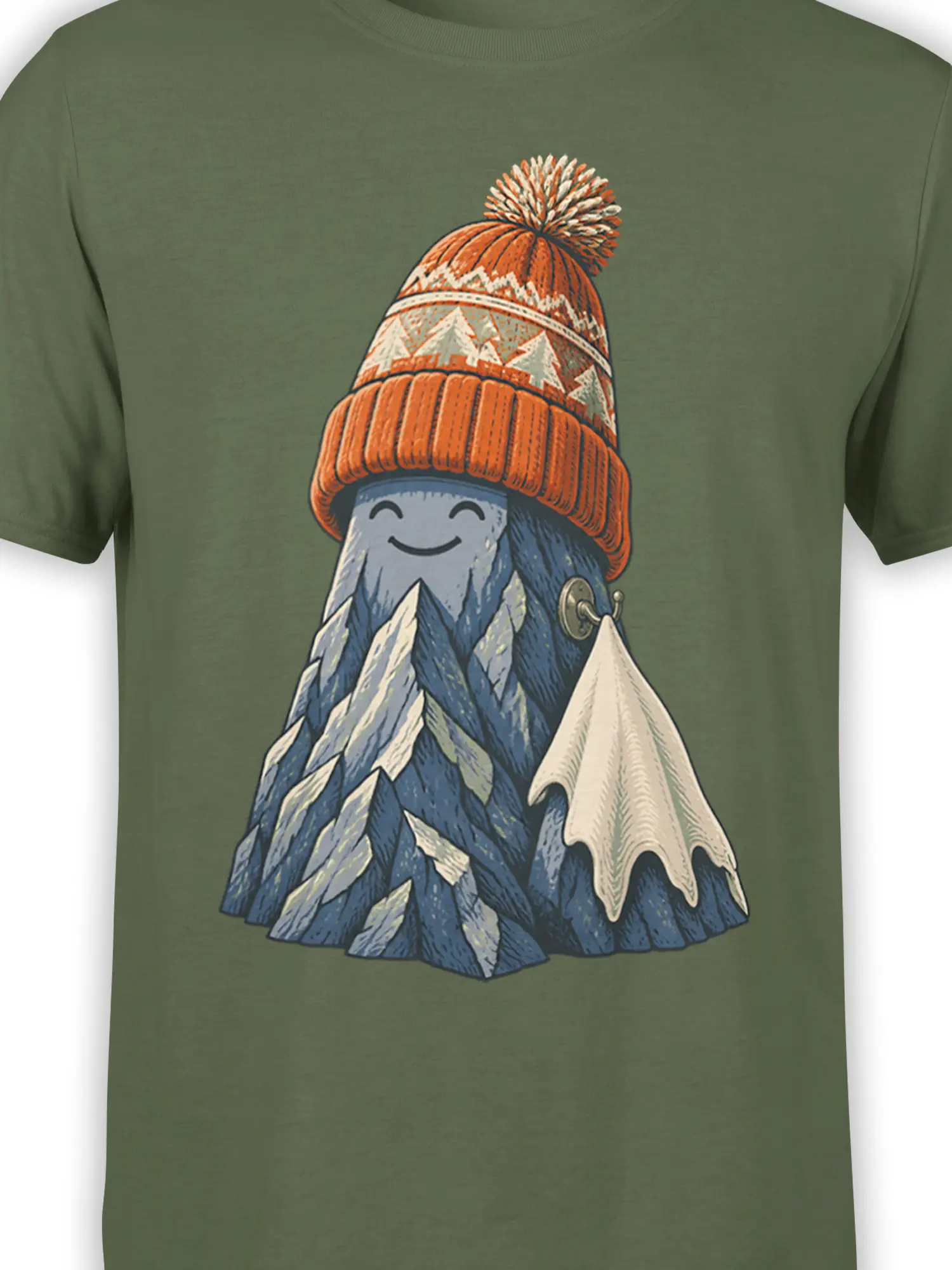 Close-up of a smiling snowy mountain and orange pom-pom hat on a green T-shirt