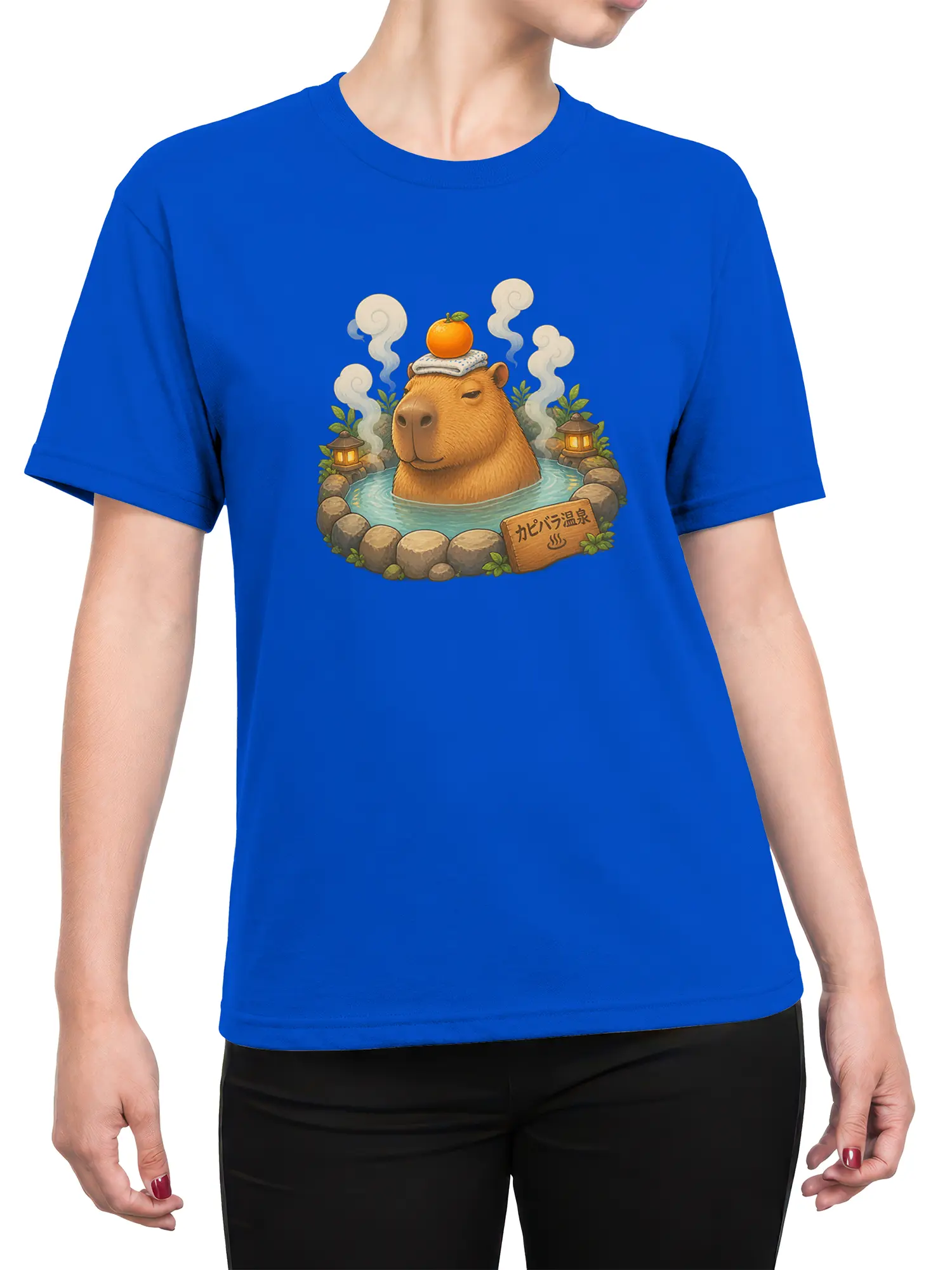 Female torso wearing a blue capybara hot spring T-shirt with a steaming spa scene and lantern details