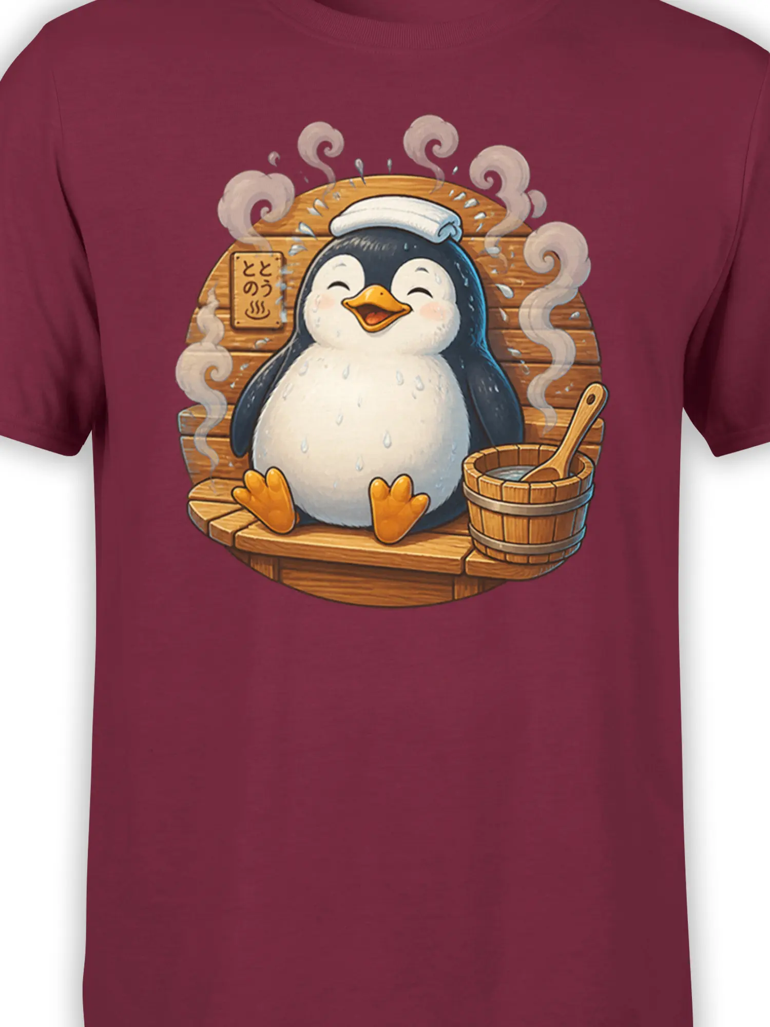 Close-up of a smiling penguin with a towel in a wooden sauna scene on a burgundy T-shirt