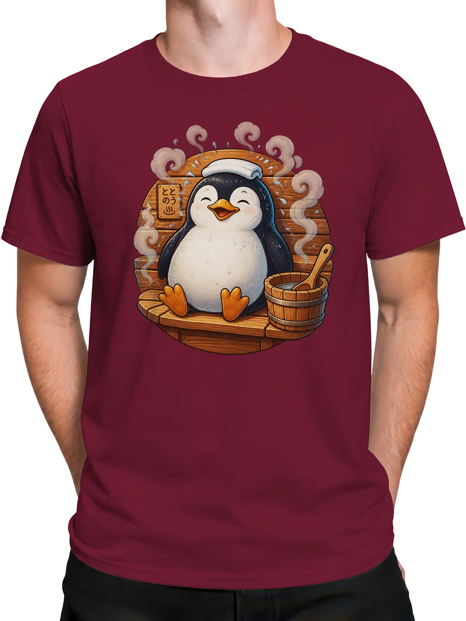 Male torso wearing a burgundy T-shirt with a cheerful penguin sauna graphic and steaming wooden bath scene