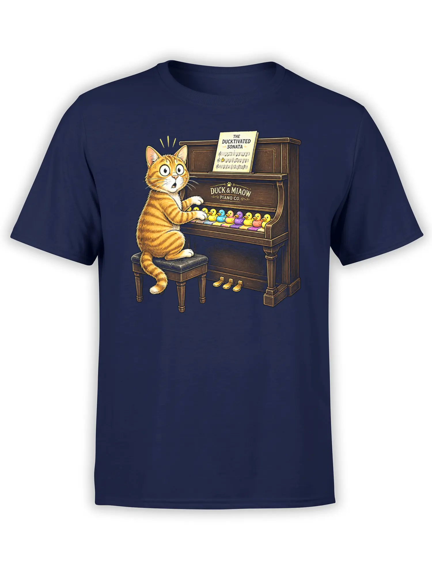 Orange tabby cat playing piano for colorful ducks on a navy graphic T-shirt
