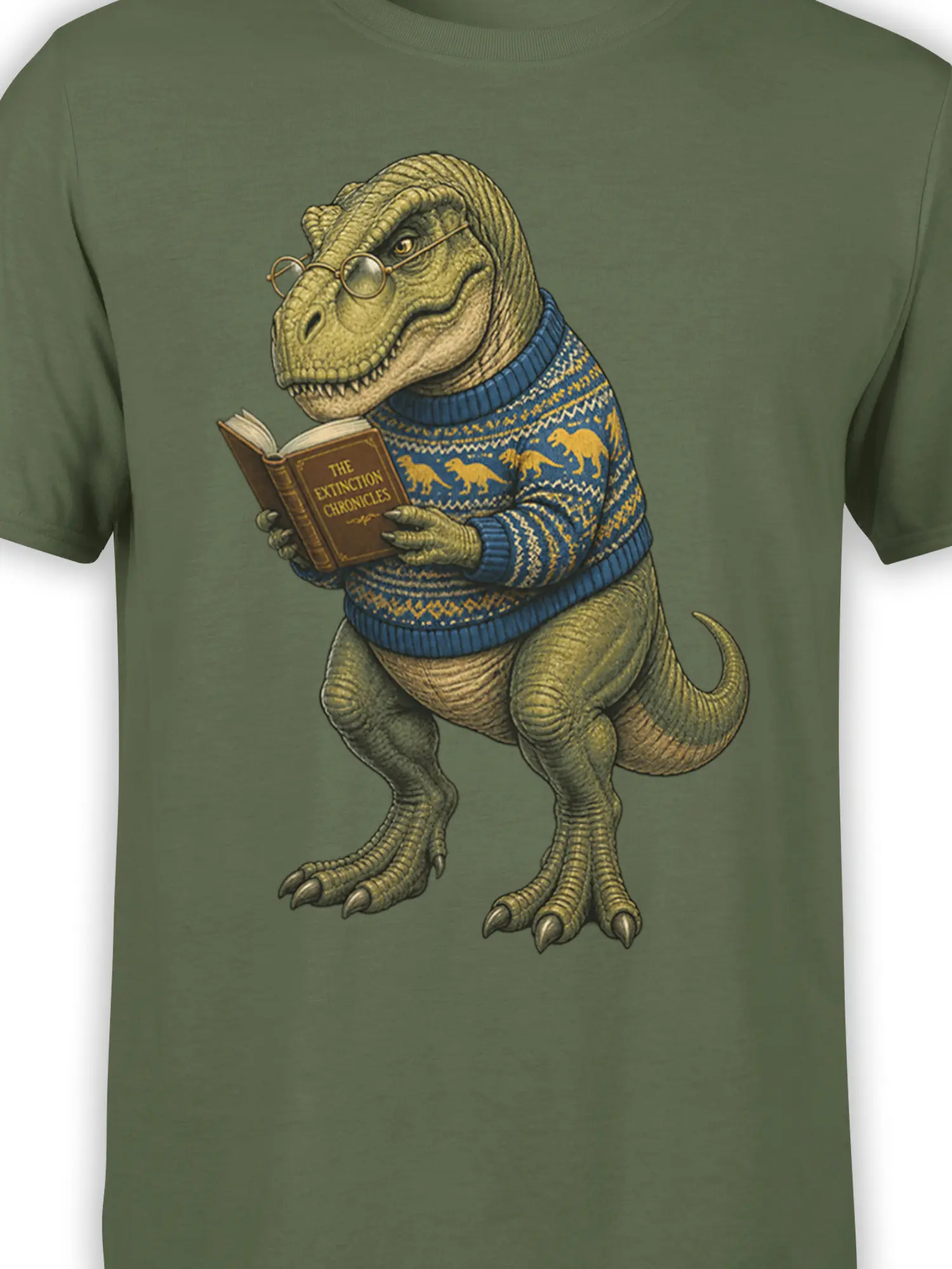 Close-up of bespectacled dinosaur reading a book on a green graphic T-shirt