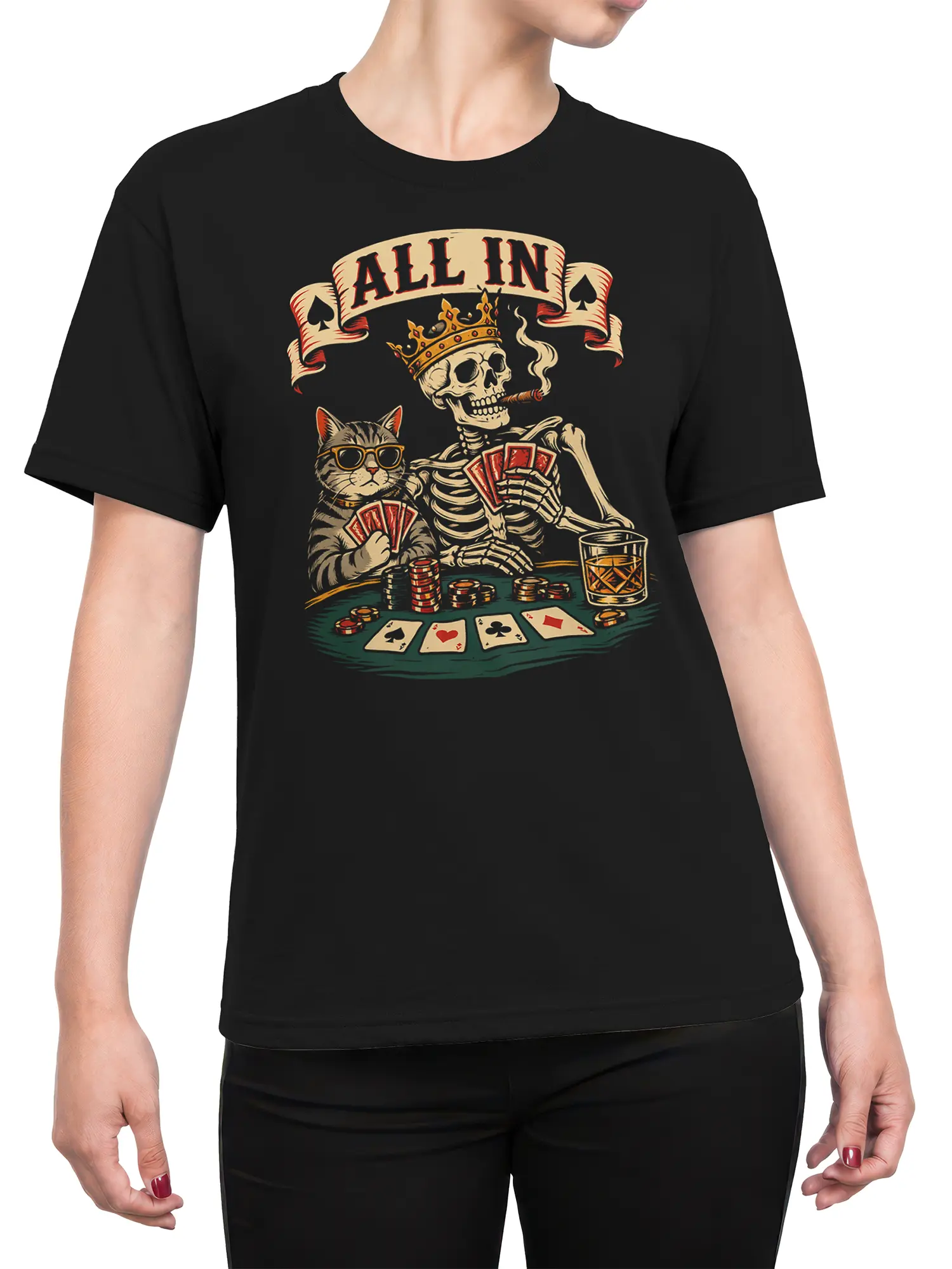 Female torso wearing black poker tee with cat, crowned skeleton, cards, and ALL IN artwork