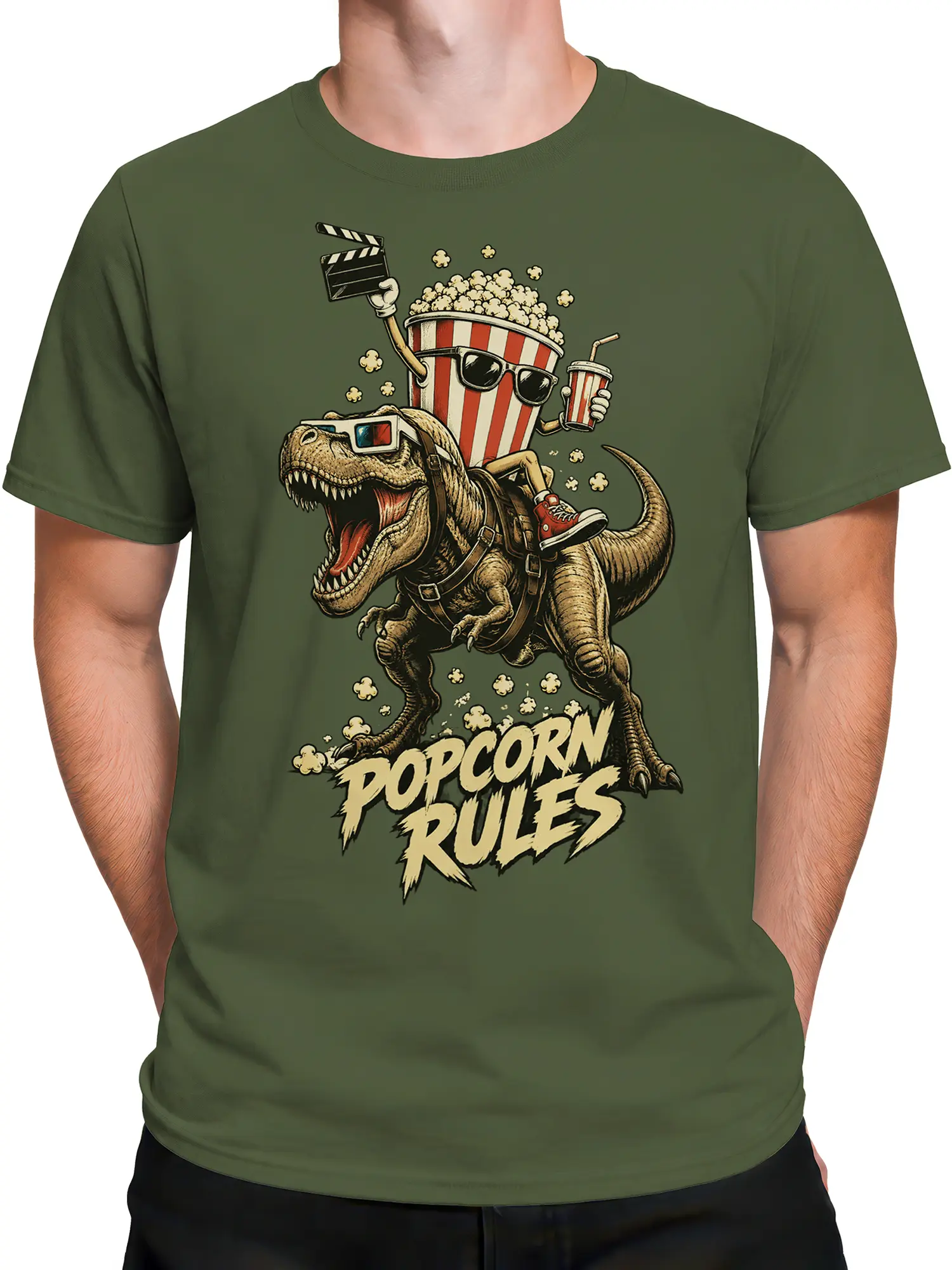 Male torso wearing a green dinosaur movie night T-shirt with popcorn, sunglasses, and POPCORN RULES artwork