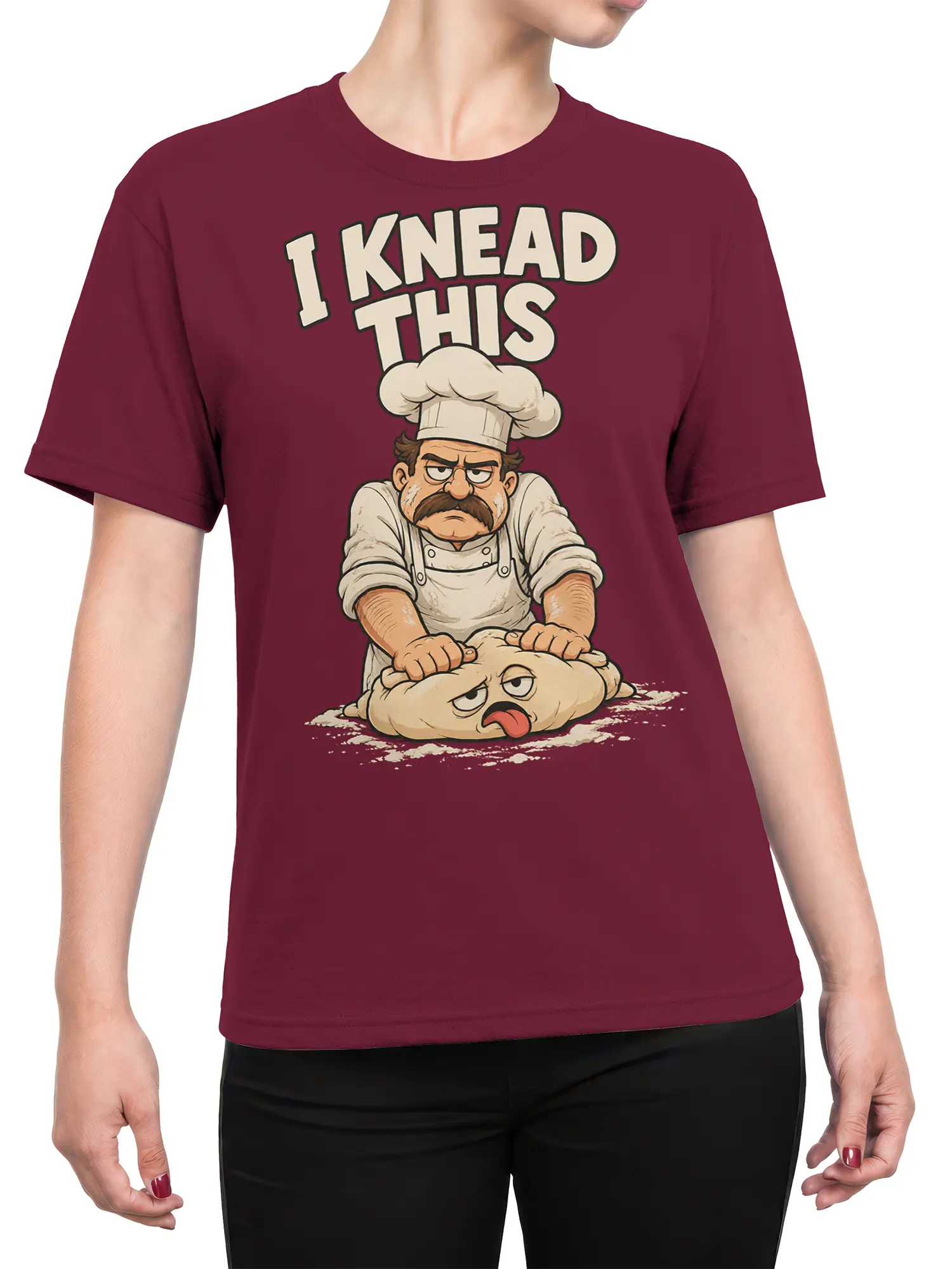 Female torso wearing a burgundy T-shirt with a mustached chef kneading dough and “I KNEAD THIS” lettering