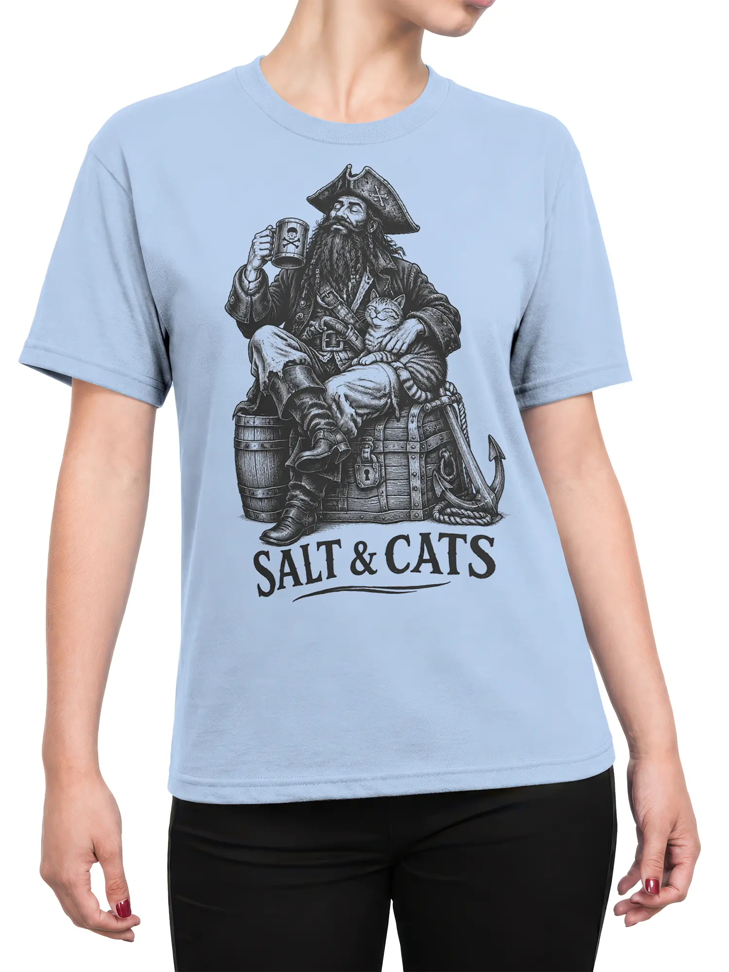 Female torso wearing a light blue pirate cat T-shirt with captain, treasure chest, anchor, and SALT & CATS artwork