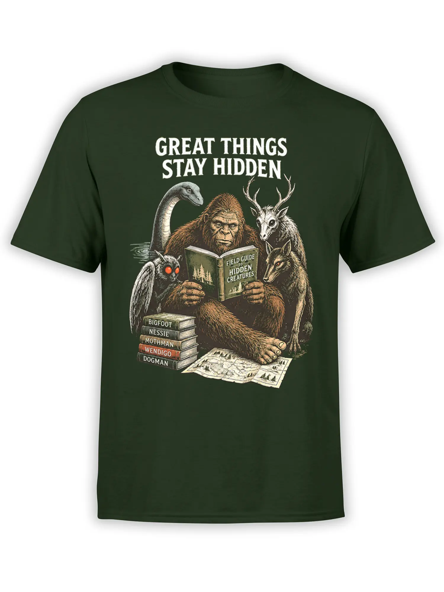 Green cryptid T-shirt with hidden creatures reading a field guide beneath the phrase Great Things Stay Hidden
