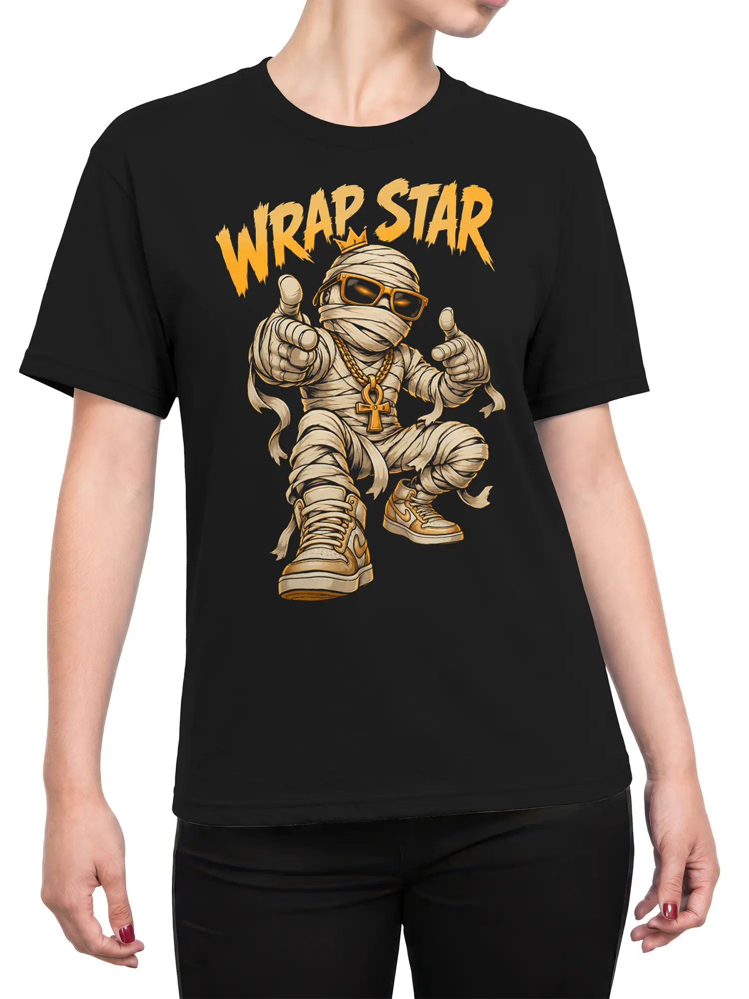 Female torso wearing a black mummy graphic T-shirt with sunglasses, gold chains, crown, sneakers, and WRAP STAR text
