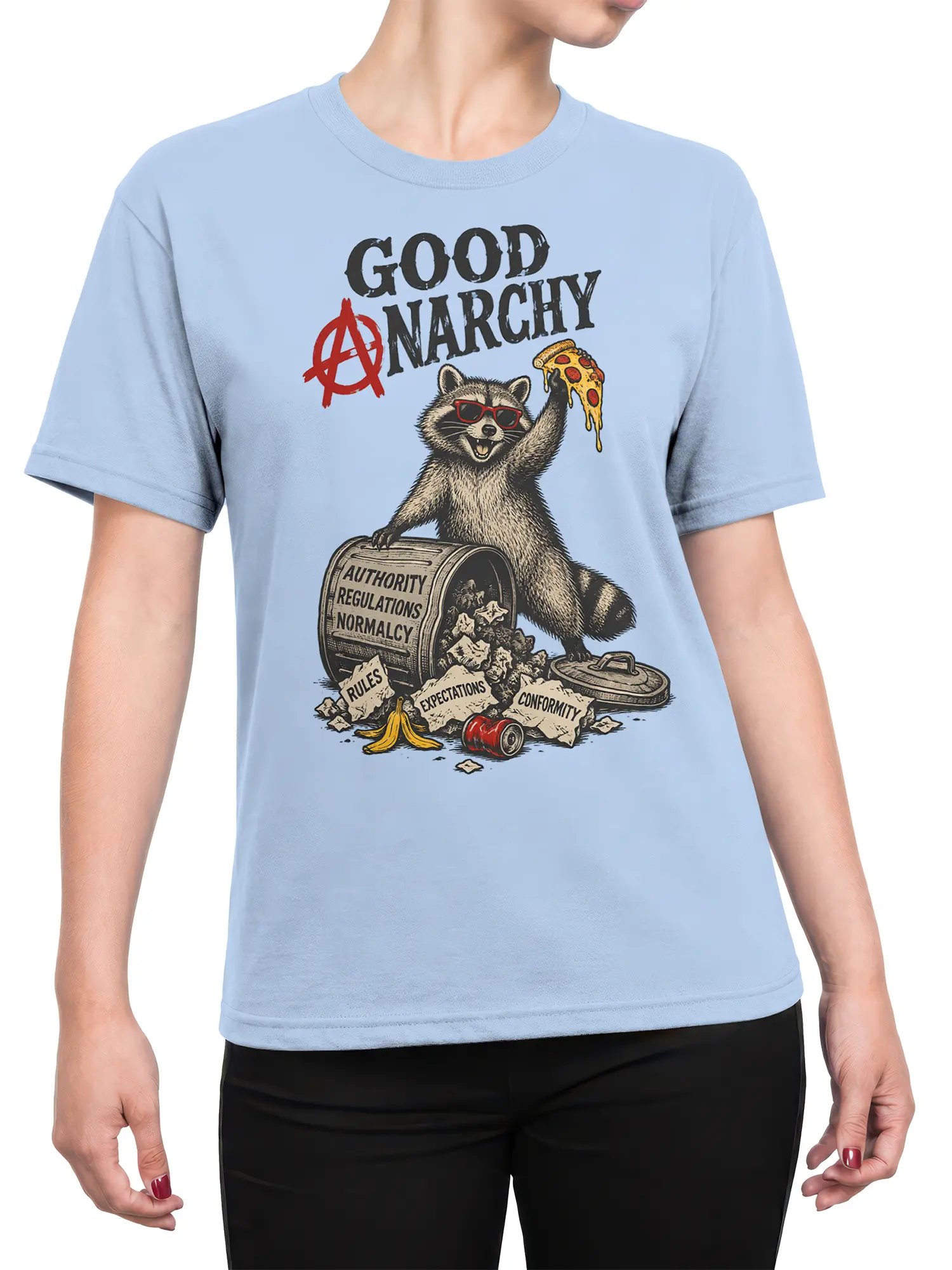 Female torso wearing a light blue raccoon graphic tee with pizza and rebellious anti-authority artwork