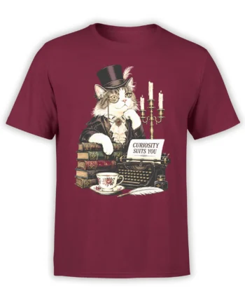 Burgundy T-shirt with a vintage cat in a top hat, books, typewriter, teacup, and “Curiosity Suits You” artwork