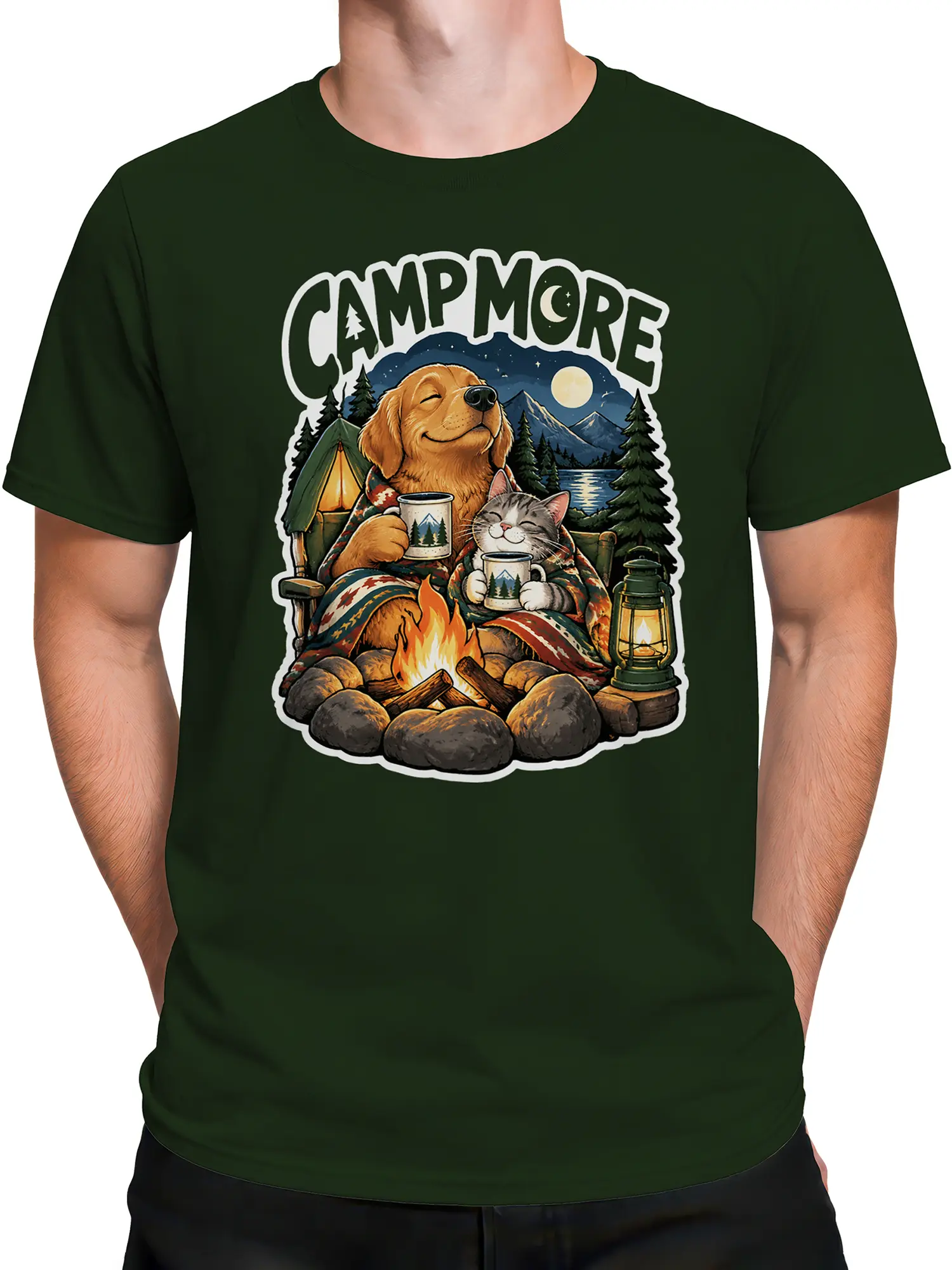 Male torso wearing green dog and cat camping T-shirt with campfire, tent, mountains, and CAMP MORE design