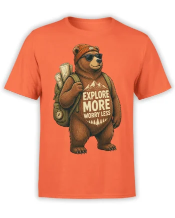 Brown bear hiking graphic with sunglasses, backpack, mountains, and “Explore More Worry Less” text on an orange T-shirt