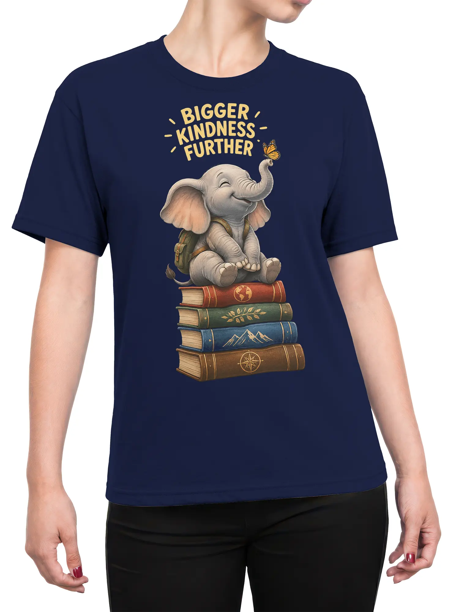 Female torso wearing a navy elephant T-shirt with books, butterfly, backpack, and kindness message