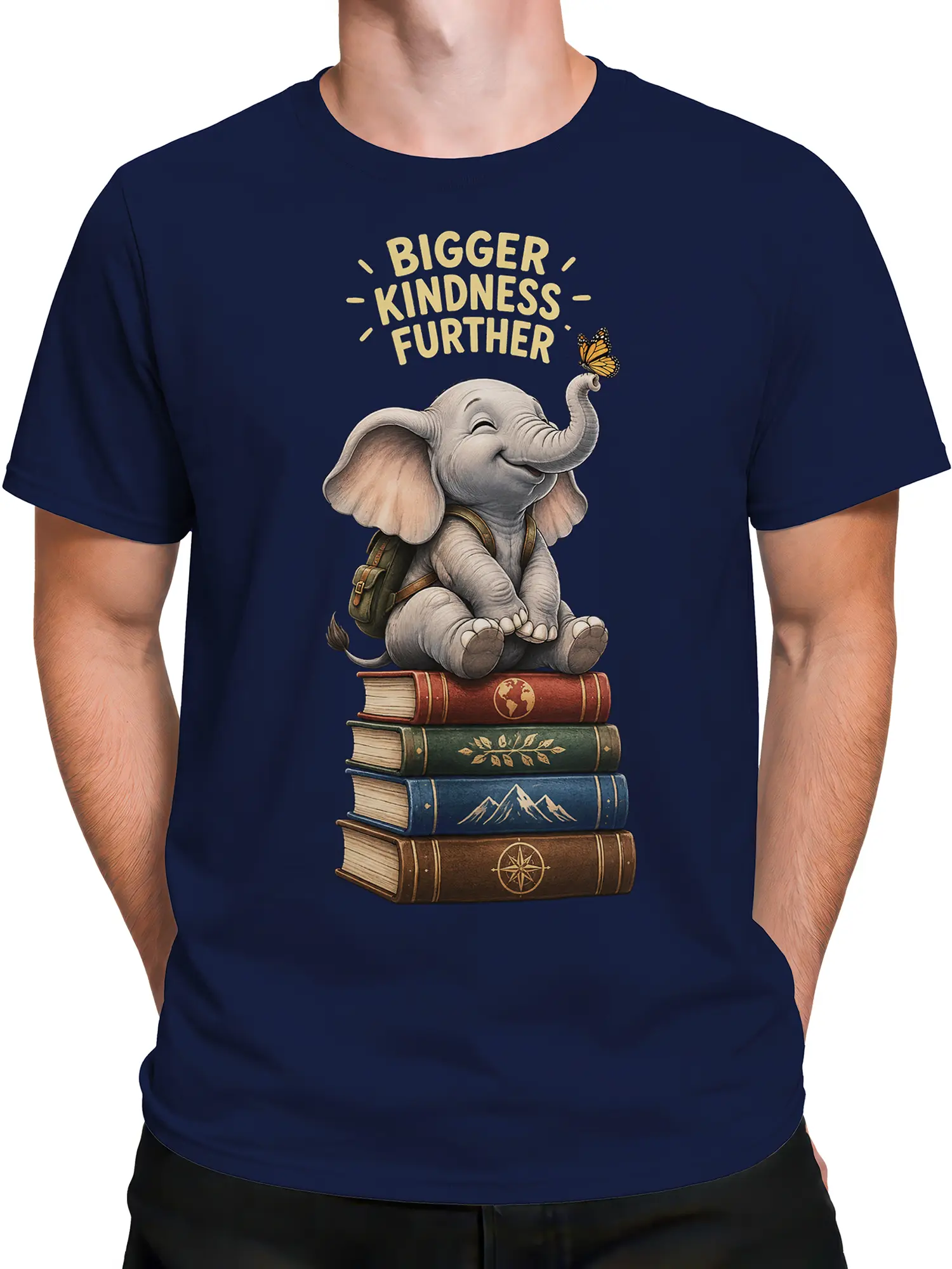 Male torso wearing a navy elephant T-shirt with books and a golden kindness message