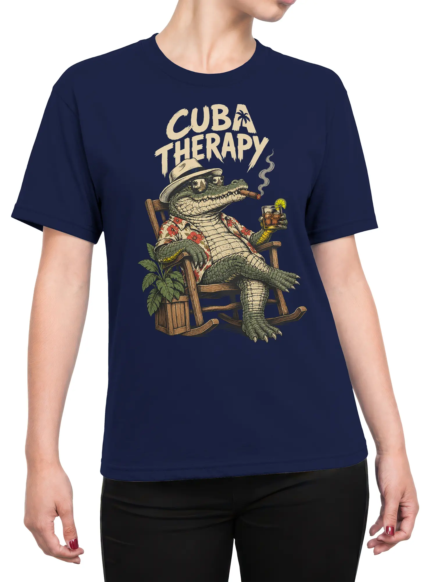 Female torso wearing a navy Cuba Therapy crocodile T-shirt with a relaxed tropical illustration and vintage lettering