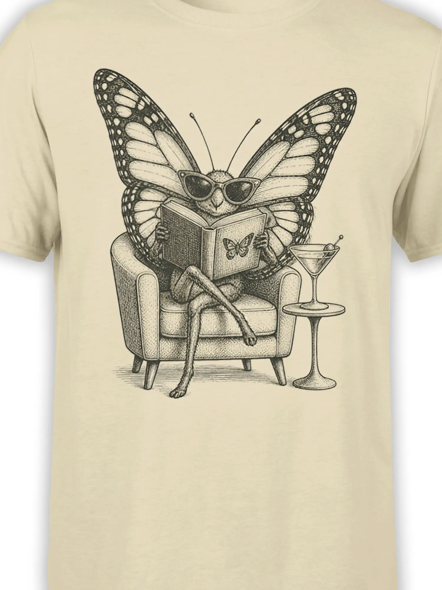 Close-up of butterfly reading artwork with sunglasses, armchair, book, and cocktail on a beige shirt